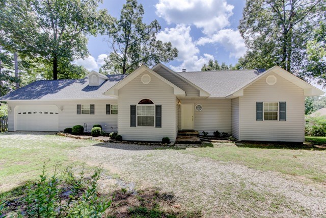Completely remodeled and still room to grow on beautiful Lake Hamilton! You'll enjoy this spacious 3 bedroom family home with wood floors, vaulted ceilings, unique rock fireplace in the great room and architectural attention to detail in every room. The large kitchen features stainless appliances and plenty of room to entertain. The back deck overlooks the waters edge and is the perfect place to catch one breathtaking sunset after another.