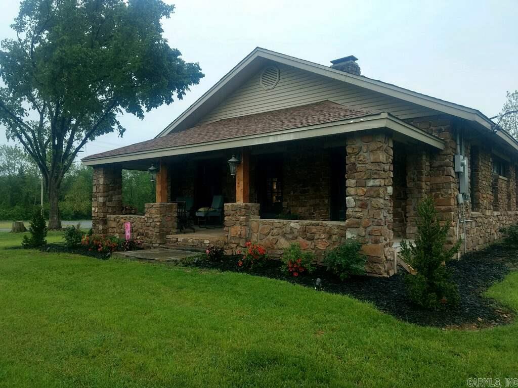 Do not miss this wonderful opportunity move to the country and wake up to stunning views of Pinnacle Mountain. This freshly remodeled 2 BR/2 BA home is perfect for entertaining. Open floor plan, large living room w/fireplace, separate dining room, and breakfast area. Potential commercial use with conversion of the home to an office. Plenty of room to build additional home or shop. New Perc test completed that would allow for additional 4BR home on the property.