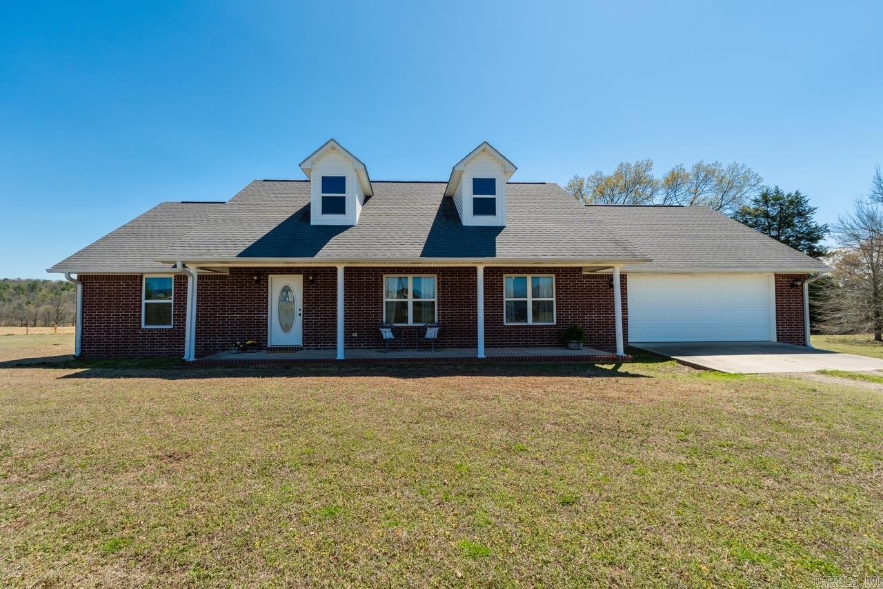 Welcome home to this charming 3 bedroom, 2 bathroom brick home nestled in the desirable Woodland area of Clarksville! Sitting on approximately 2 beautiful acres, this property offers the perfect blend of peaceful country living with the convenience of town just minutes away. Step inside to find comfortable living spaces filled with natural light and a layout designed for everyday living. Whether you’re hosting family gatherings or enjoying a quiet night at home, this home offers a cozy and welcoming atmosphere throughout.  Outside, you’ll love the extra space and privacy the 2 acres provide. There’s plenty of room to enjoy the outdoors, start a garden, add a shop, or simply relax and take in the scenic surroundings.