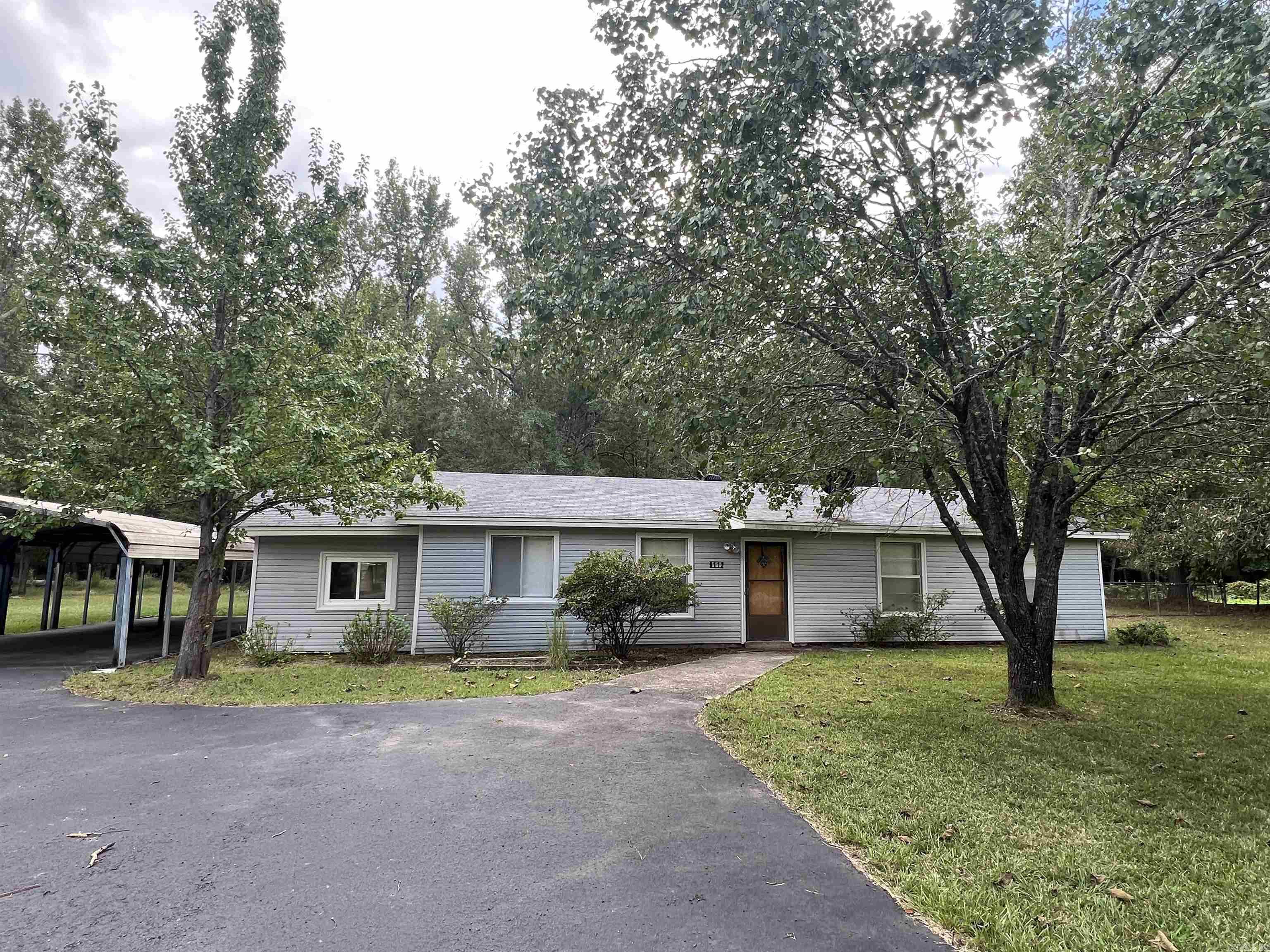 Cute 3 bed 1 bath home sitting on just over an acre of land with potential for a fourth bedroom. This house is located in rural Pine Bluff, the property includes an additional sunroom, shed for storage, storm shelter and fully fenced backyard. Home is being sold AS-IS. Call to setup your showing today!