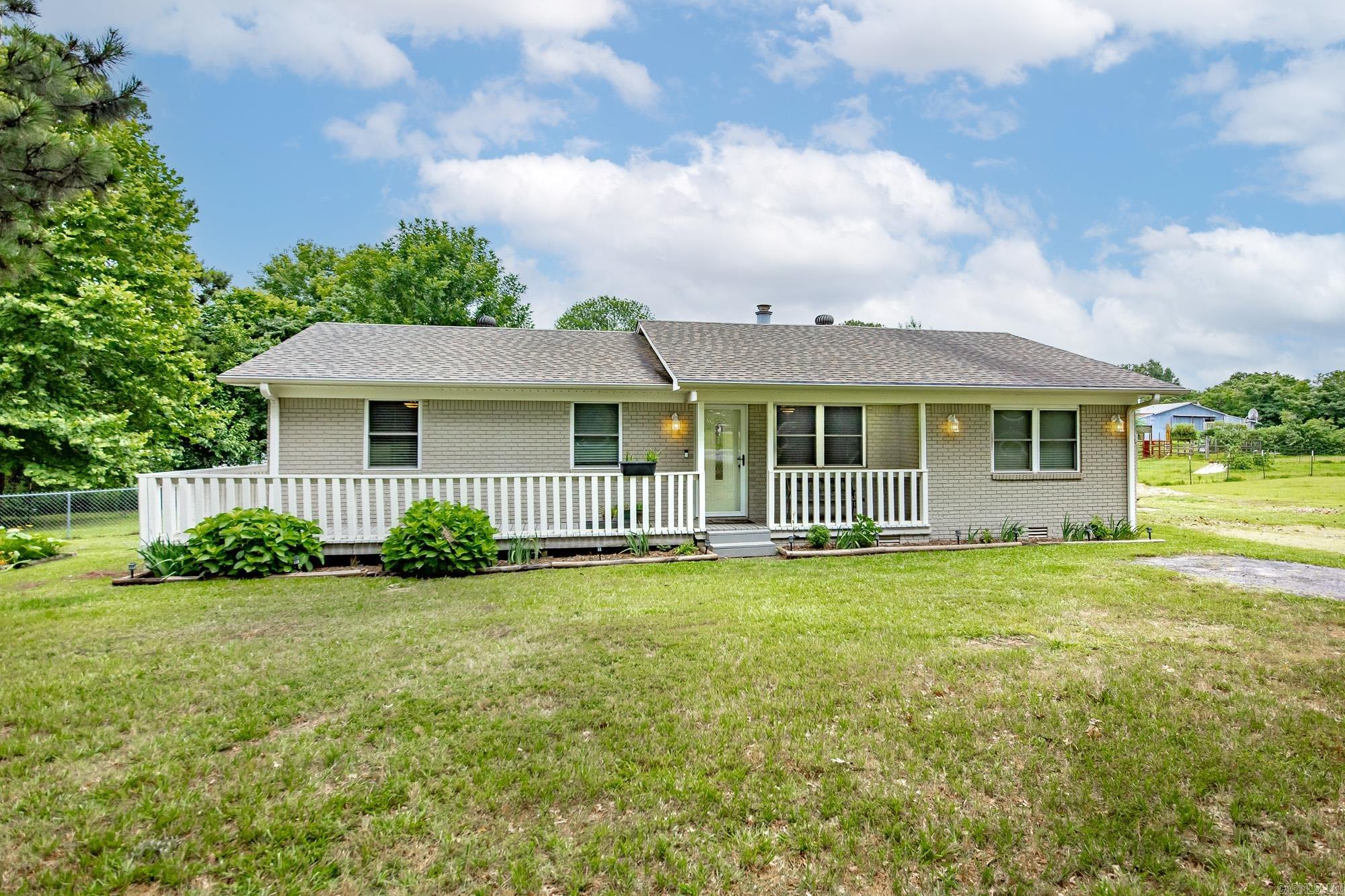 Move in Ready & Experience the growing community of Beebe AR, just 25 mins to LRAFB and 8 minutes to Cabot Shopping & Dining. This is affordable homestead lifestyle, grow your own garden and enjoy the peace and quiet! Coffee on your newly built deck & side porch 2025. Roof in 2018, HVAC 2022, HWH 2025 New Microwave 2025, new doggie pen 2024. Wired for ADT security(not active)  Large Great room w/free standing cast iron wood burning pot belly style stove for cozy winter nights and low winter energy costs.