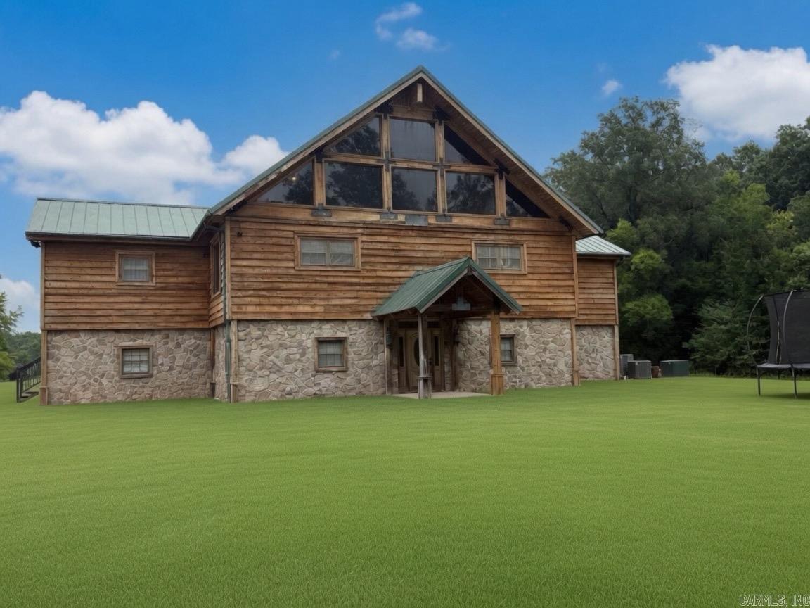 Welcome to an extraordinary hunting and recreational retreat. This impressive six-bedroom, six-bath hunting lodge was designed for comfort and entertaining, with each bedroom featuring its own bathroom. The heart of the home is the chef-inspired kitchen, equipped with two professional-grade cookstoves featuring gas cooktops and electric double ovens, beautiful granite countertops, a large island topped with handcrafted butcher block, and two stainless steel refrigerators. The dining area has space for gathering with family, friends, hunting groups, or corporate retreats. The laundry room includes two washers and two dryers. The master suite serves as a private sanctuary, complete with dual vanities, a stunning walk-in tiled shower, a clawfoot cast-iron double soaker tub, separate water closet, and an enormous walk-in closet. The land features 40 acres of precision-graded irrigated farmland, 15 acres of non-irrigated farmland, a 35-acre reservoir, a stocked pond, and 168 acres enrolled in CRP, creating outstanding habitat for waterfowl and wildlife. Additional income is generated through a Lamar billboard sign lease,and property includes two wells, a 28x34 shop and a 5x7 pump shed.