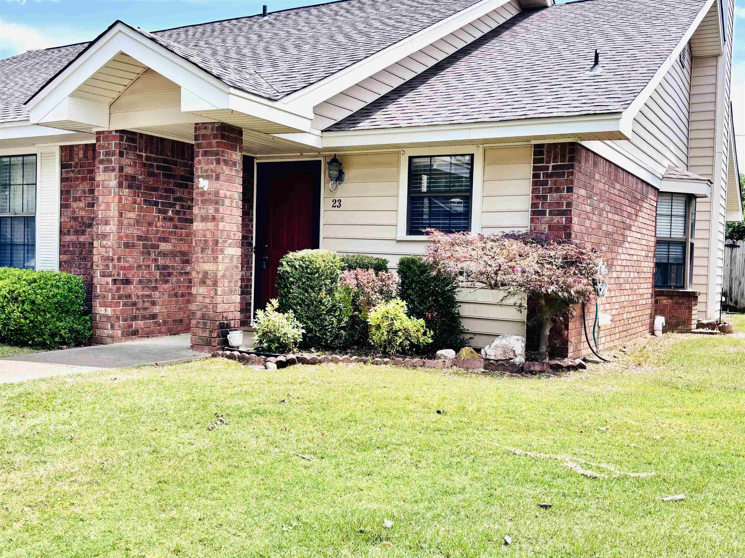 Welcome to this one level condo in the Dark Forest community, offering comfortable living space and easy, low-maintenance living with convenient access to I-30, shopping, dining, and entertainment. The open living/dining combo features a gas fireplace and bay window, plus a breakfast bar, ideal for casual meals and entertaining.  Updated appliances in the kitchen, including the gas stove/oven, vent-a-hood, and dishwasher. This move-in ready condo is perfect for retirees, first-time buyers,, or investors seeking simple living, with a focus on a straightforward, uncluttered way of life. Whether you're relaxing on the covered patio or enjoying community spaces, this home offers comfort and convenience in one package. Nestled in a friendly neighborhood setting and priced competitively—schedule your private showing today and make 23 Dark Forest Place your new home.