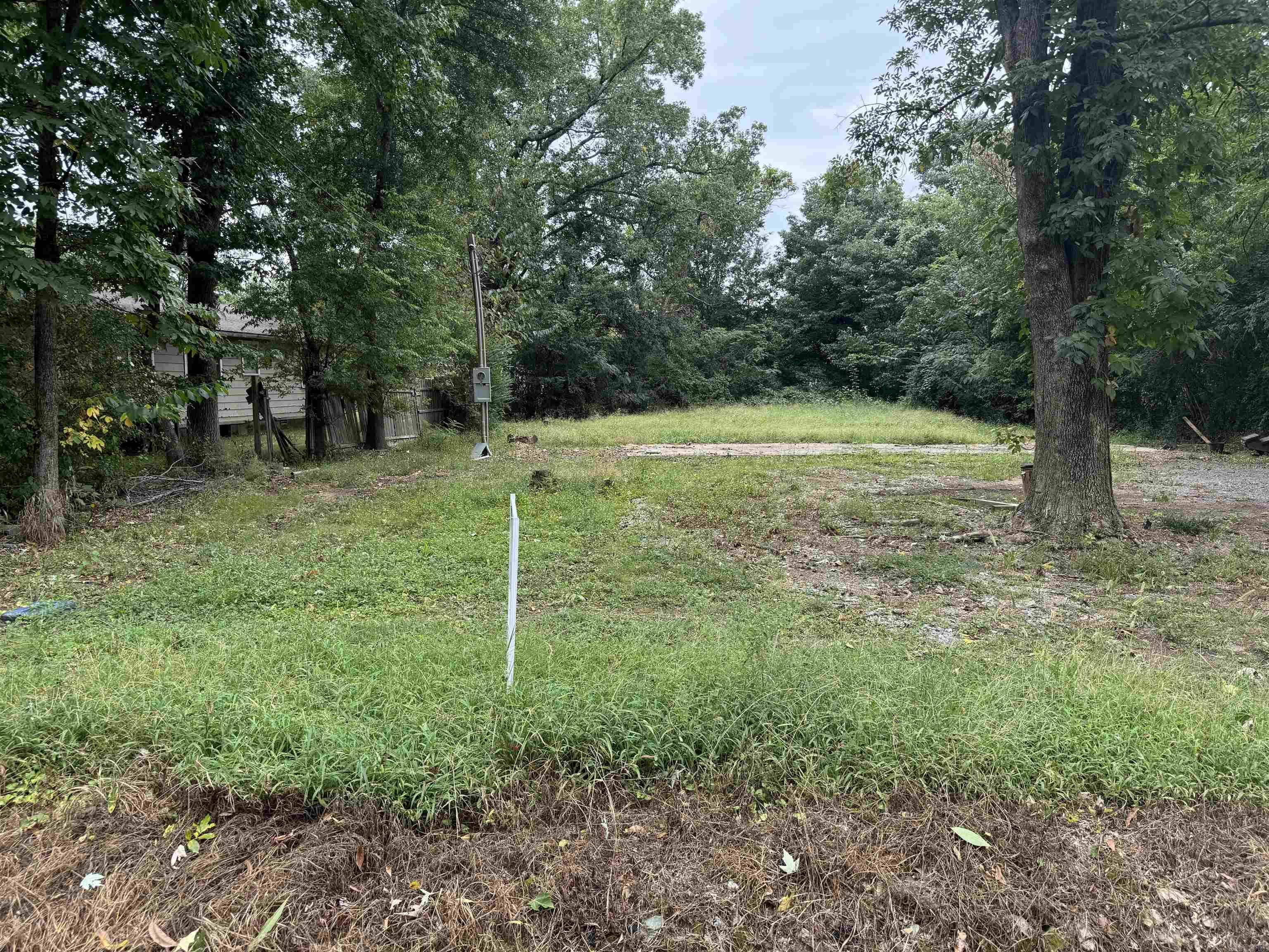 Do you enjoy the great outdoors?  Boating and fishing just feet away from Lake Conway, this lot is the perfect combination of serene and tranquil living.  Just a couple of minutes gets you on the interstate.  New water line, septic line and electric pole placed in April 2020.  This lot is perfect for that get away home you've been dreaming about.