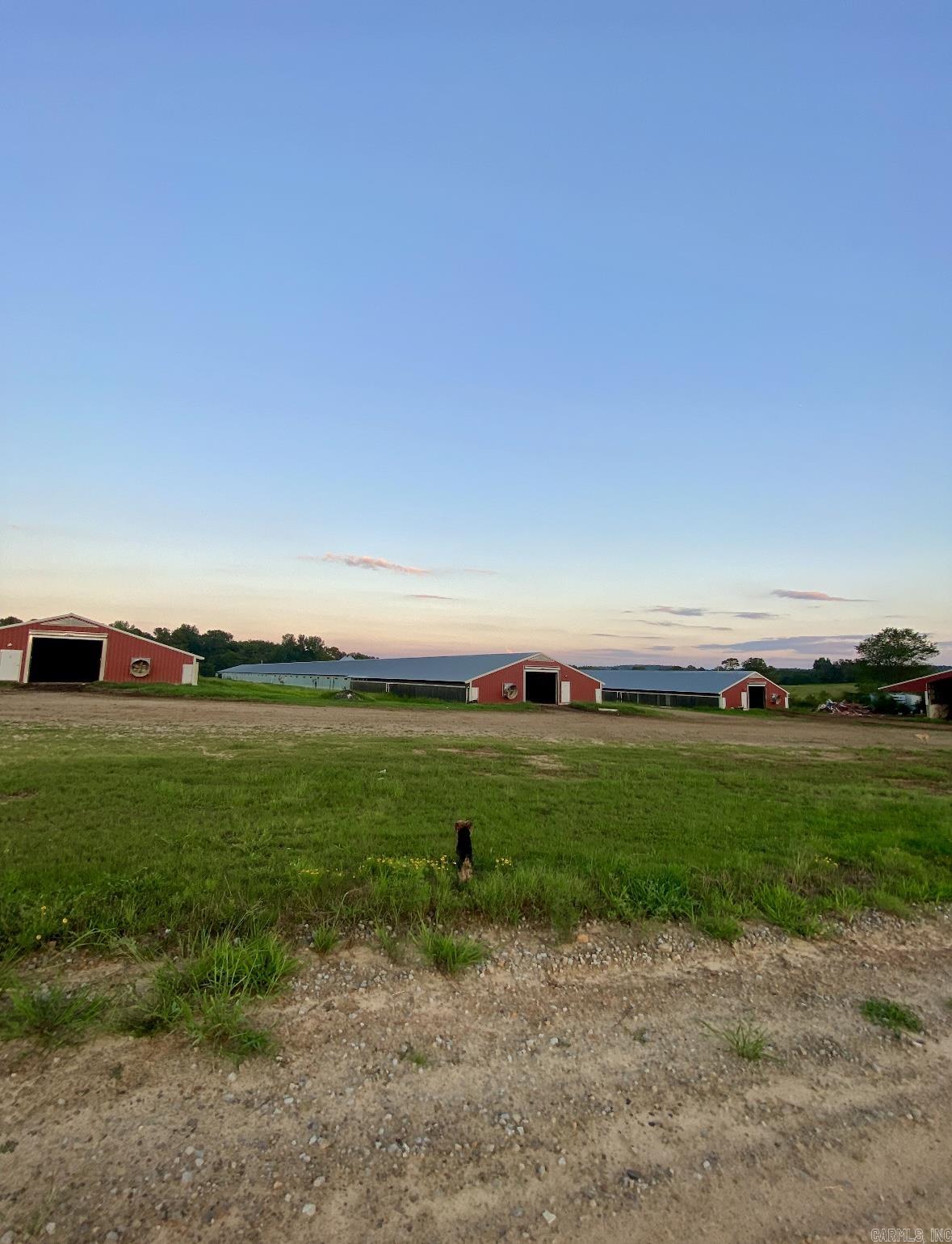 Calling ALL Poultry farmers!!   * 4 Poultry Broiler Houses (43’ x 510’, built in 2002) *Active contract with OK Foods with incentive payouts  *NEW pump *Propane tank filled *Iron corral with holding chutes and 5 holding pens *Storage shed and well house *Rural water  *updated new feedlines and waterlines *18,000 gas tank for chicken houses.  Whether you’re seeking a high-potential income property, a private farm retreat, or a working livestock and poultry operation, this property checks every box.