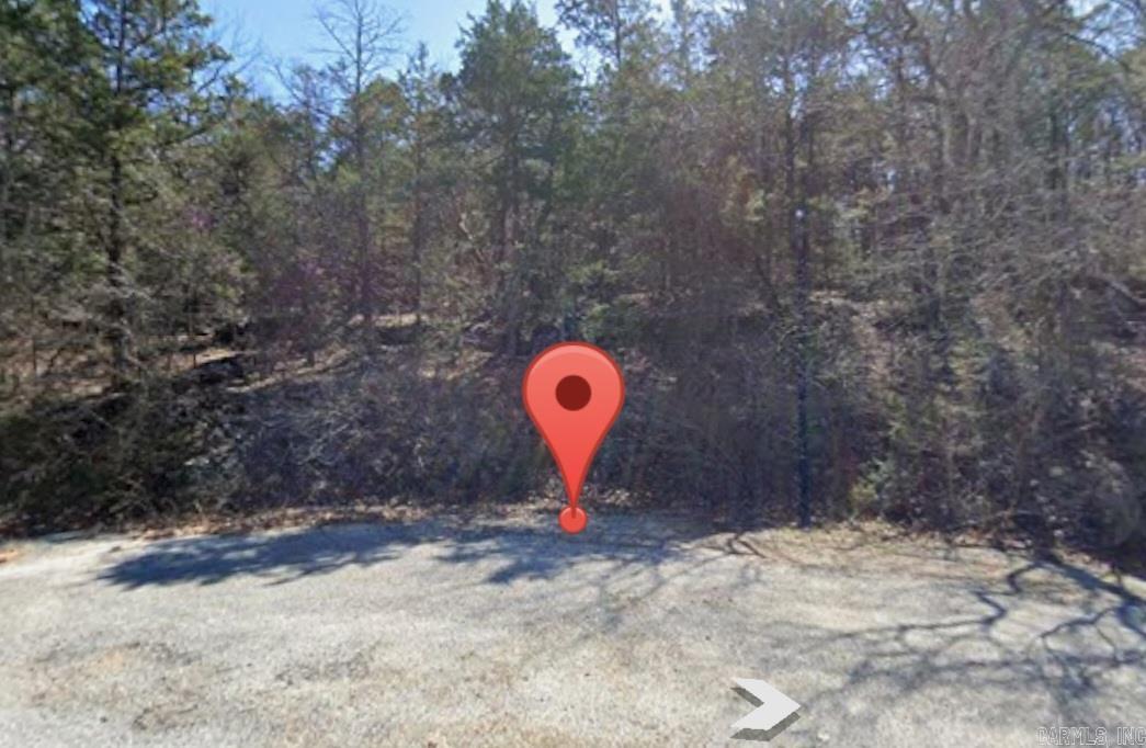 Welcome to Holiday Island of Carroll County, Arkansas. You will love to have your new home built here at the end of a cul-de-sac that is a .30 (+/-) acre lot. The area has beautiful scenery, close to Holiday Island Marina, surrounding amenities and just a short drive to Eureka Springs. Electric is at the road, sewer, and city water. Call or text for more information!