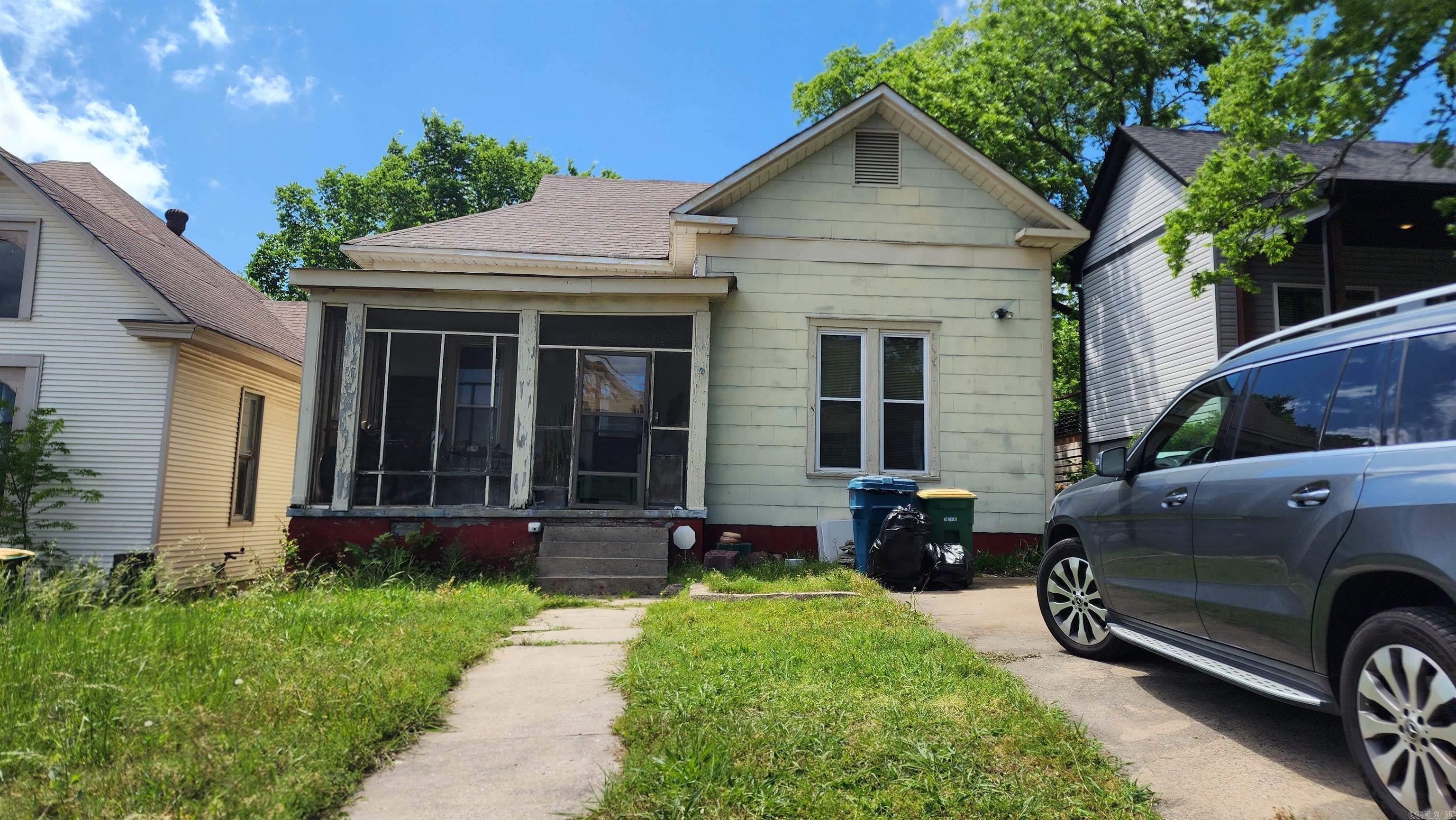 This 2 bed, 1 bath property features aproximately1,400 sq ft of living space (Measurements are approximate, please verify), plus two bonus rooms with limited ceiling clearance on the bottom floor. The front study adds flexibility, and the porch offers a clear view of the Capitol. Needs updates, but it’s a solid opportunity for investors or buyers with vision. No Showings until Monday, May 5th, 2025