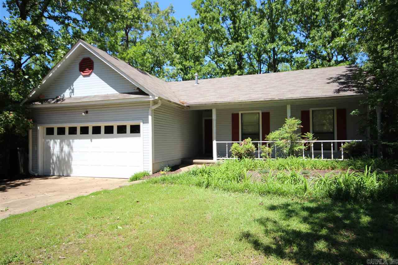 Cute one owner home conveniently located near the interstate. Pretty vaulted ceiling in the living room with wood burning fireplace. Newer laminate floors throughout. Level lot with fenced yard. Home has had foundation issues but has been repaired and comes with a transferrable warranty. Needs cosmetic work but would be a good investment! Square footage is approximate. Measuring is encouraged. Home is being sold "as-is".