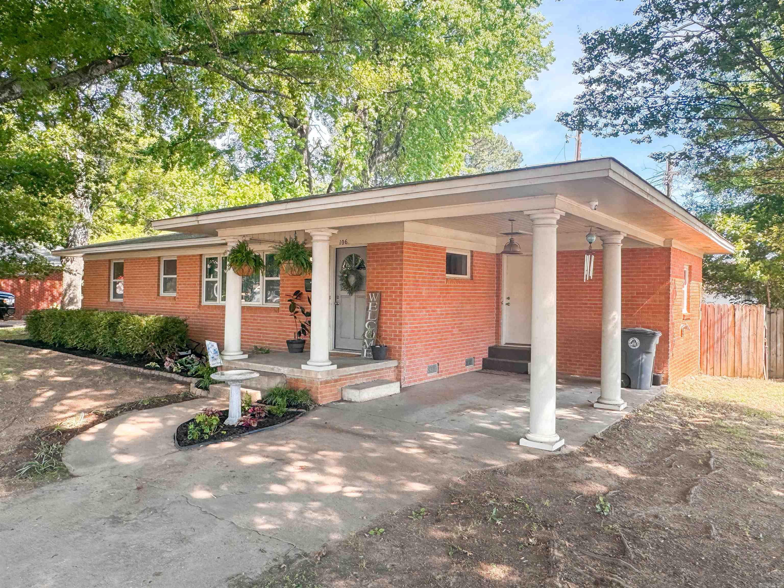 Very nice solid brick home with wood floors and a fenced backyard with a great storage building in the heart of Searcy not far from Harding University. Inside features a new gas stove in kitchen, wall oven, granite countertops, and a versatile sunroom/2nd living area! Would also make a great office or playroom! Laundry room features shelving and a newer water heater. Would make a great starter home or investment property! This home also includes a security system with cameras. Call today to get your tour of this cozy home!