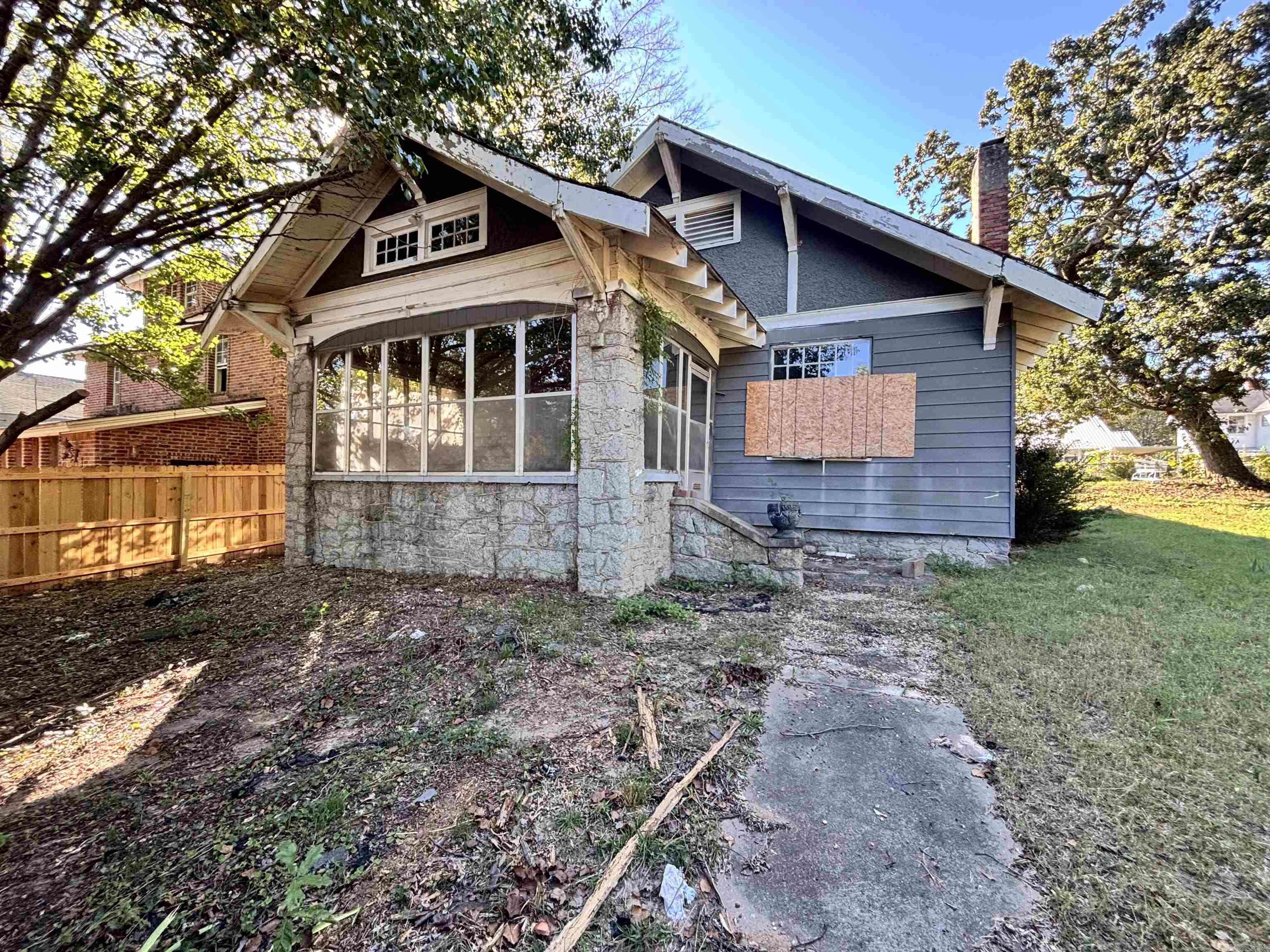 Discover the potential in this 3½-bedroom home located at 1515 W 22nd Street, just minutes from Children’s Hospital and downtown amenities. This property features a large screened-in front porch, offering the perfect spot to relax and enjoy the neighborhood. The home does need a complete remodel, making it an excellent opportunity for investors, flippers, or anyone looking to design their dream home from the ground up. With its solid structure, great location, and endless possibilities, this property is a true blank canvas ready to be brought back to life. AGENTS SEE REMARKS.