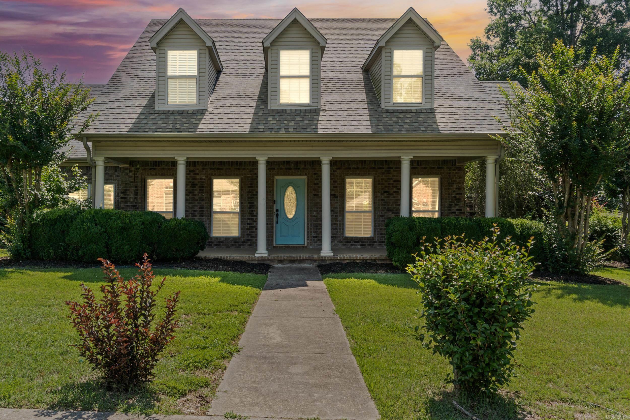Imagine sitting on the country-style front porch of this 5-bedroom, 3.5-bath home, enjoying your morning coffee before the day begins. From relaxing by the fireplace to unwinding on the back deck, this home offers space for both everyday living and entertaining. The main level includes two living areas, a primary suite with a walk-in closet, oversized laundry room, and an additional main-level bedroom/office. The kitchen features double ovens, an electric range, a triple-basin sink, and a refrigerator that conveys. Upstairs, you'll find a secondary suite with an adjoining flex space currently set up as a home theater. Five recliners, projector, screen, and theater equipment will convey. Two additional bedrooms share a Jack-and-Jill bathroom, while a loft/flex space and upstairs laundry hookup add even more versatility. Major updates include a roof replaced in 2022, upstairs HVAC system and ductwork replaced in 2023, both water heaters replaced in 2023, and an extended driveway. Located within walking distance of Longhills Golf Course (where membership discounts may be available to subdivision residents) and convenient to essential amenities, and major commuter routes.