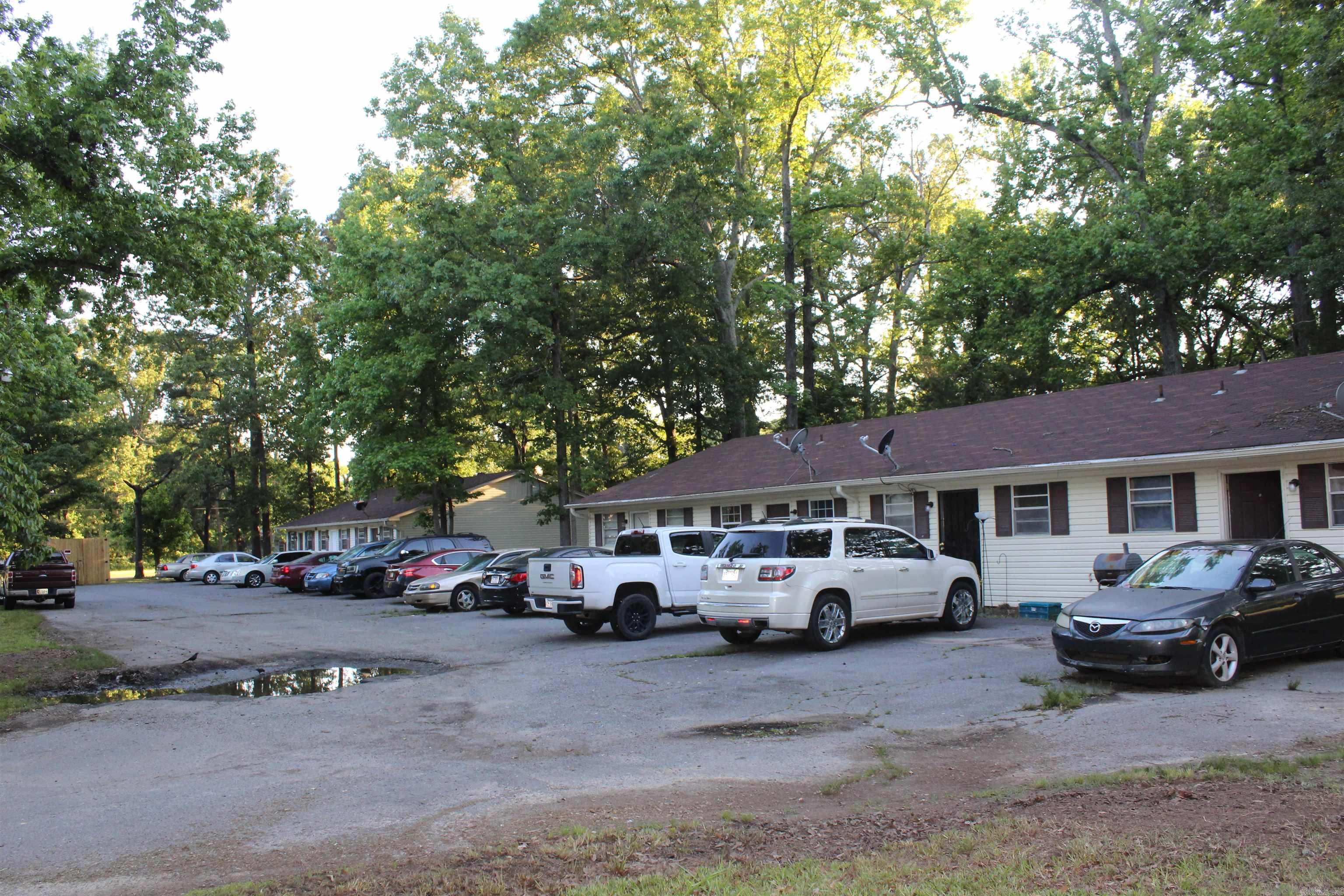 Attention Investors!!! Great 14 unit complex that stay full with a waiting list. Over $70,000 in capital improvments over the last three years. Average rents are 485 with room for growth with further upgrades. Don't miss this opportunity to own this cash cow!