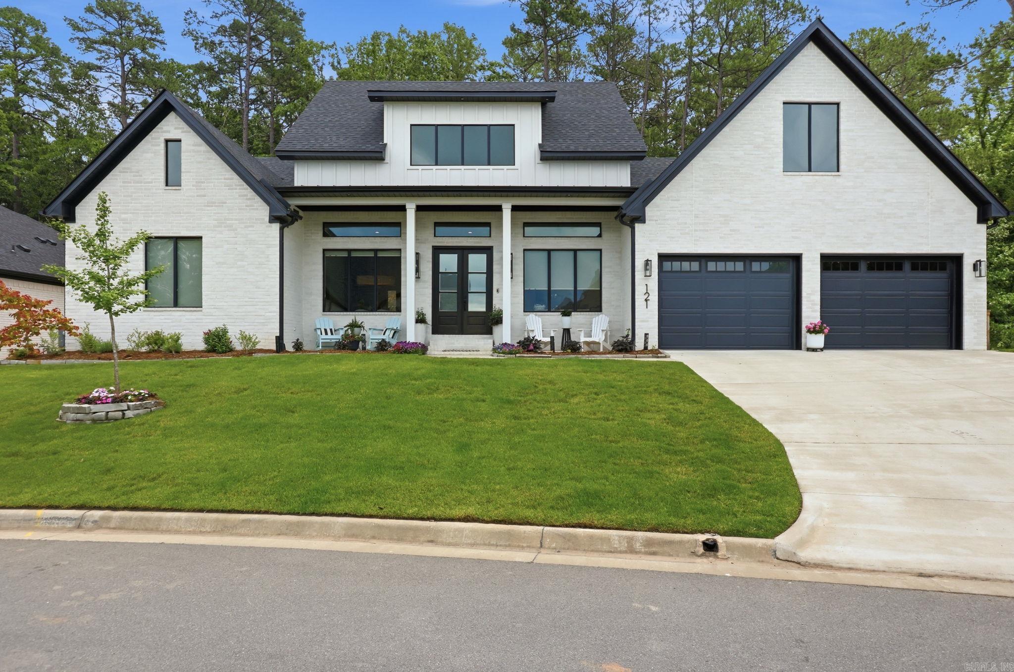 I am pleased to present this designer-curated, single-level home. As the crown jewel of the neighborhood, this property offers unmatched craftsmanship on a prime corner lot with sunset views of Pinnacle Mountain.  The interior features 12-foot ceilings and an open-concept layout with high-end designer finishes. The chef's kitchen is equipped with a premium cooktop, double oven, Sub-Zero refrigerator, and a large center island. This spacious home includes three bedrooms, three full baths, an office, and a combined butler's pantry and laundry room. Additional amenities include a 96" LED electric fireplace indoors and a wood-burning fireplace on the outdoor patio. The primary suite offers dual vanities, a walk-in shower, a freestanding tub, and a spacious closet with a center island. All windows are fitted with designer shades for added luxury and privacy.  Please contact listing agent to schedule a viewing today.