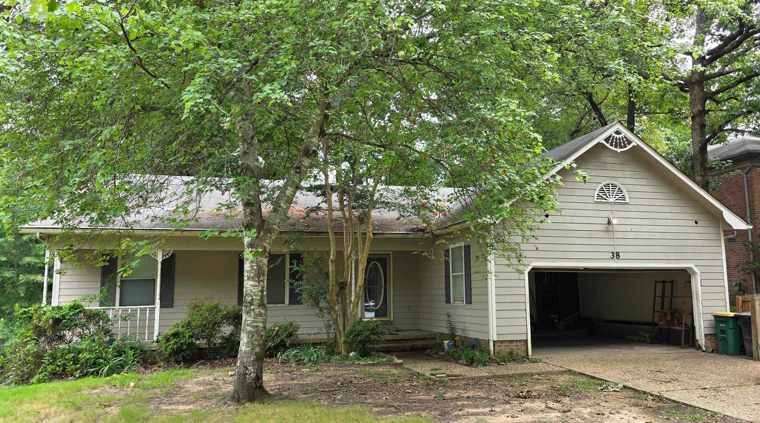 Spacious home in the established Marlowe Manor subdivision. Home features hardwood flooring in the dining and main living. Living room has built ins, brick fireplace, high ceiling and windows looking into the well shaded back yard. Master features huge double walk-in closet. New deck just built on back of the house. House will need some updates. Perfect opportunity to make it your own. Marlowe Manor POA features a community park with playground included in the Assoc. fee. Community pool is available at a small cost.  See Remarks on POA closing info.