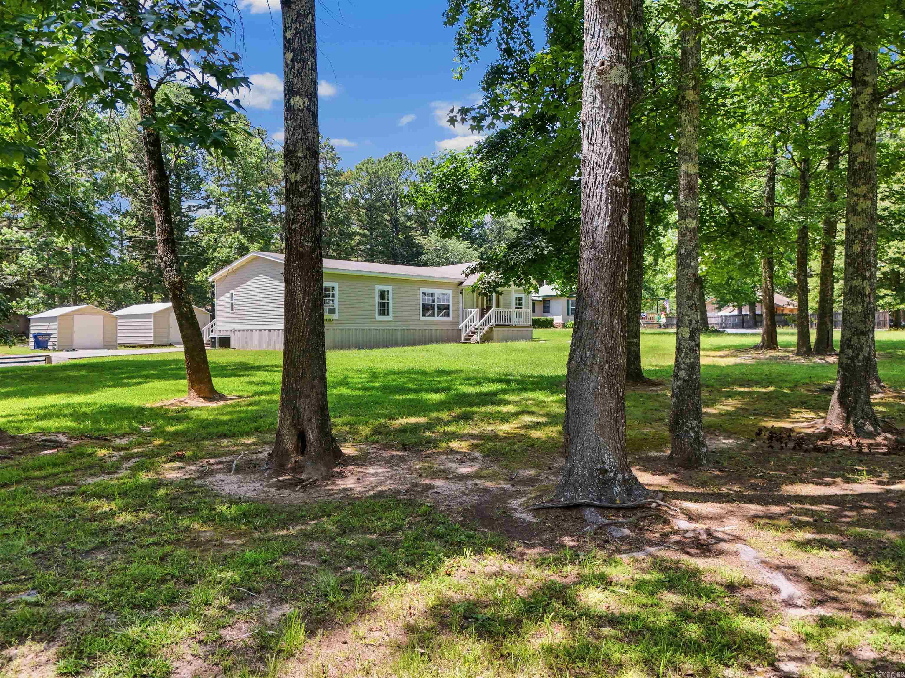 Discover the perfect blend of comfort, space, and lake living! This well-built 3-bedroom, 2-bath home sits on over half an acre just TWO miles from a Greers Ferry Lake boat launch. Inside, you'll find crown molding throughout, energy-efficient R-19 tilt-in windows, sturdy 2x6 walls, a spacious walk-in shower, and a gas range. Outside, enjoy the deck and a 10' x 15' storage building.Plus, a new HVAC system installed at the end of 2024 provides added peace of mind. Whether you're looking for a full-time home or a weekend lake retreat, this property is ready to impress! Be sure to check out the aerial drone video and the 3D tour. Agents, see remarks for more info!