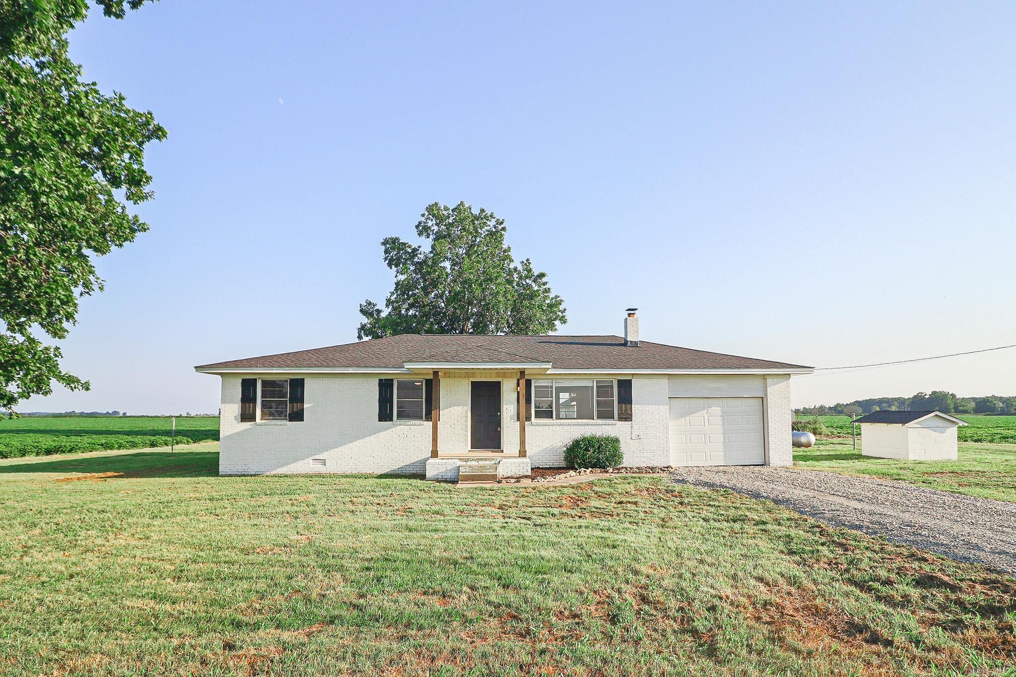 Beautifully refinished country home with privacy and no close neighbors. This all brick home has a new roof and nice interior updates. The land is approximatley .83 acres with multiple outbuildings. The interior water is St Francis rural water and exterior is a private well. This is a great opportunity for RD financing.