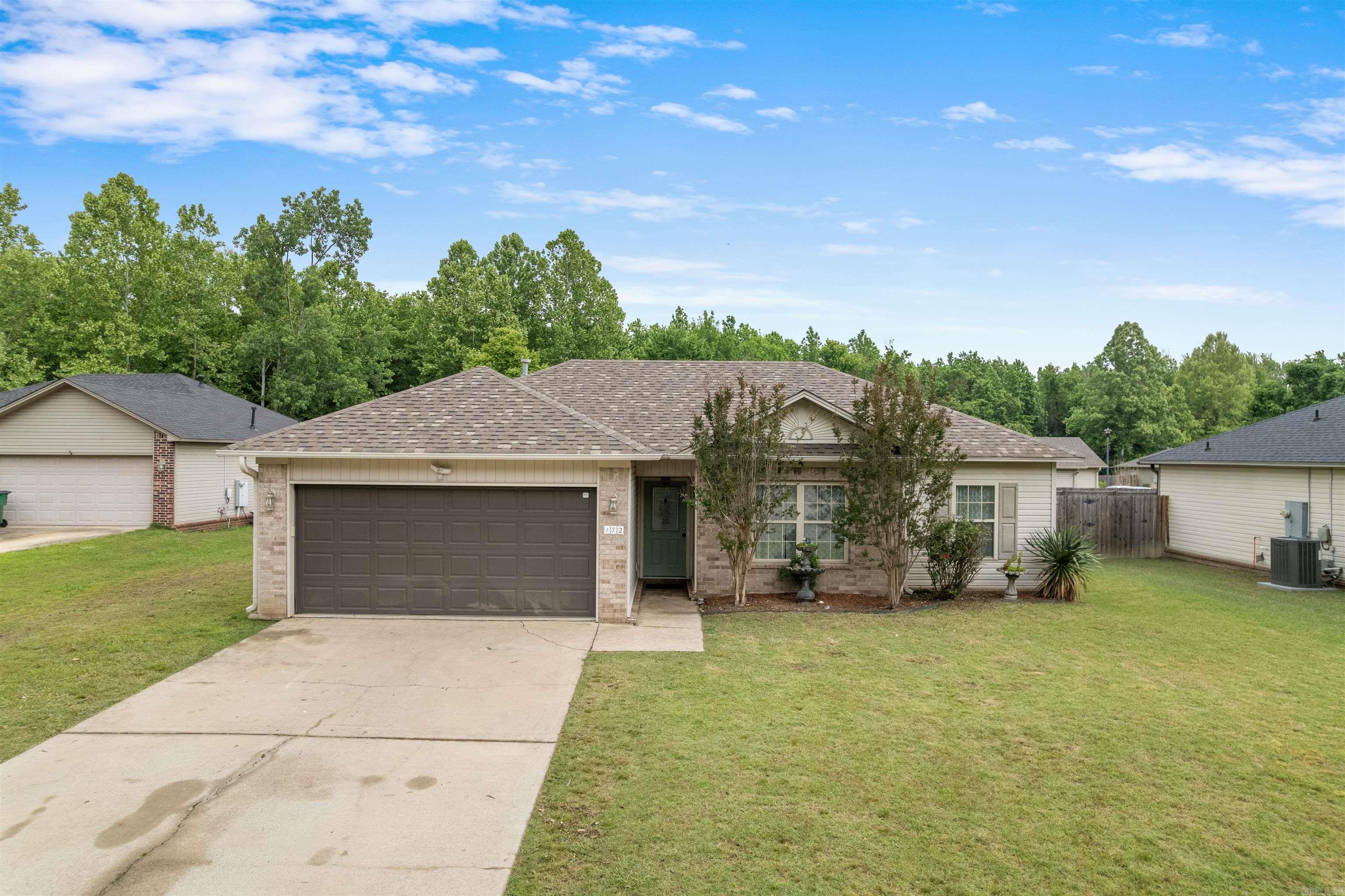 Charming 3 BD, 2 BA home with 1,152 sq ft in Austin! Recent improvements include new flooring, fresh paint throughout, and a new stove in 2026, plus a new roof in 2023. This single-level home features an open living/dining area, white kitchen cabinetry, stainless steel appliances, breakfast bar, and decorative backsplash.  Enjoy a fenced backyard with a covered patio/pergola area, perfect for relaxing or entertaining. This home also features an extra heated and cooled room off the entry for use such as a man cave, craft room or office. Move-in ready and conveniently located in an established neighborhood!