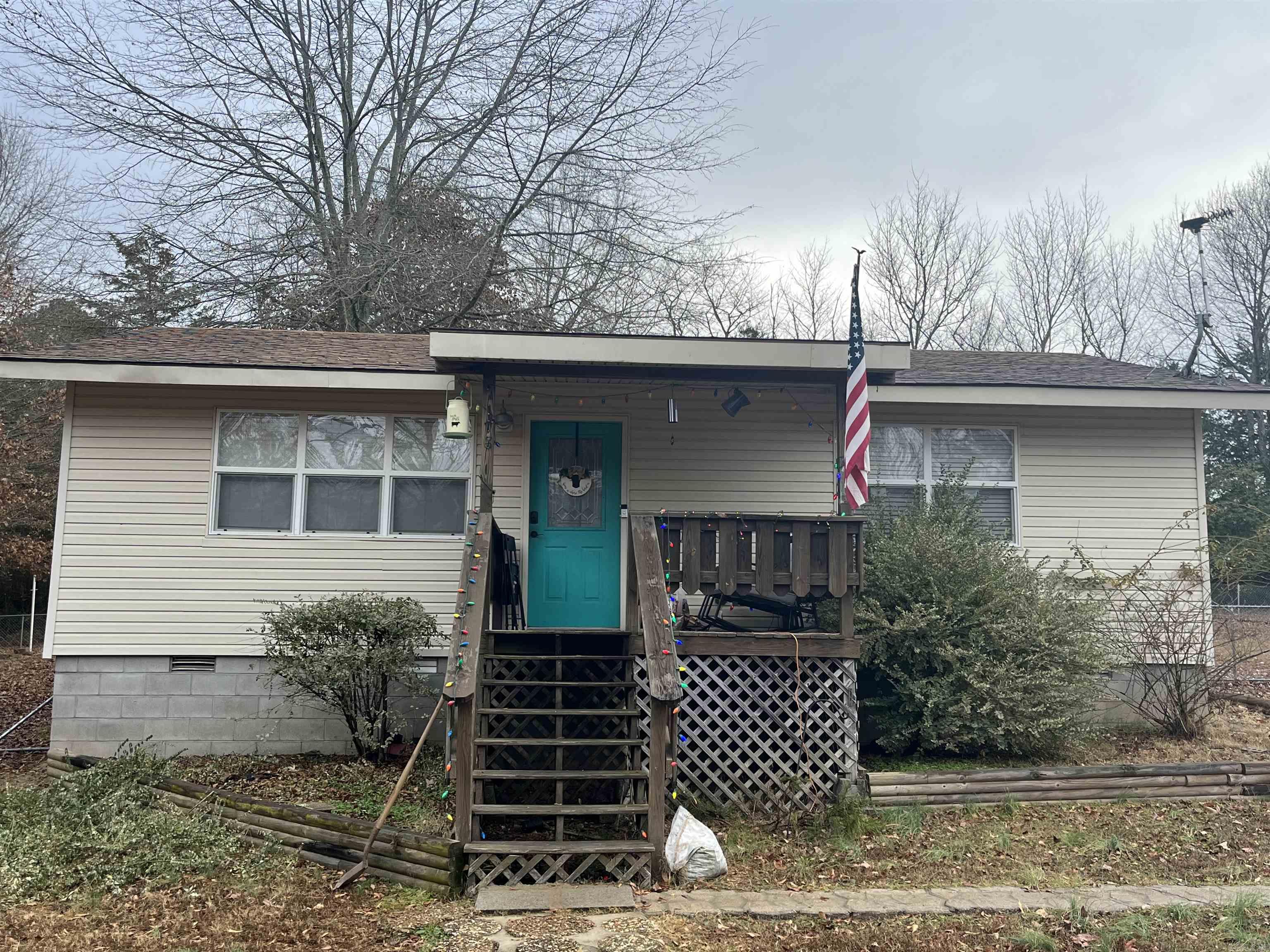 TUCKED AWAY ON THE OUTSKIRTS OF TOWN IS THIS CHARMING HOME! This adorable 2 bedroom 1 bathroom is perfectly set on 1.39 acres, making a generous yard AND fenced in with large garage/shop in the back! Turn key ready to move in, already updated, and a BRAND NEW HVAC! QUALIFIES FOR ZERO DOWN! Call today!