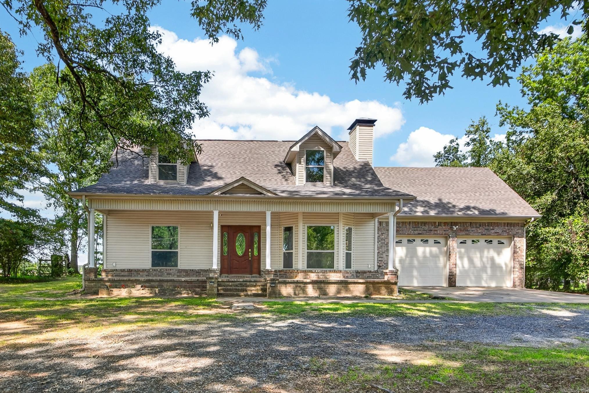 Don't miss out on this nice 3 BR home with bonus room that could be 4th BR. Primary BR on main level, 2 BR, bath and bonus room upstairs. This home has so much to offer, including solid surface counter tops, laminate floors, lots of storage, wood burning fireplace, big front porch, large deck and 20x20 shop with power. This home is situated on .82 Ac, property line in the back goes past the fence. Newer roof 2022. Ready for a new family! Take a look today!