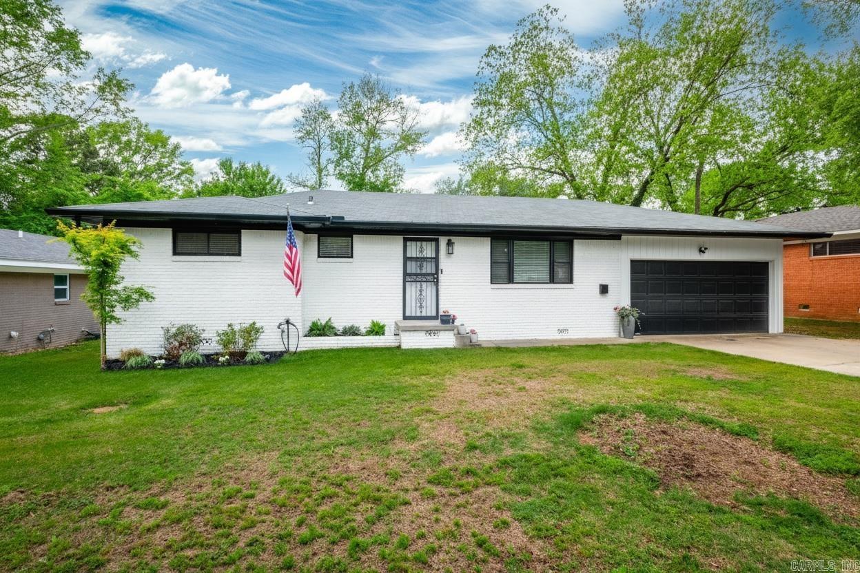 Gorgeous one level in excellent Briarwood location. Original hardwoods refinished in 2023. throughout living areas and bedrooms. Kitchen with island open to living area. Tons of updates including: new paint throughout, kitchen remodel including floors, new breaker box installed, new windows 2025, exterior upgrades 2025, fresh exterior paint, new fascia & soffits, new gutters, vinyl updates, new hot water heater 2025, HVAC serviced with new compressor 2024, all doors re-hinged, custom blinds installed throughout, light fixtures replaced. 1.5 car garage with added storage. Backyard shed. ***Original 3 bedroom home that can be converted back prior to closing upon request.***