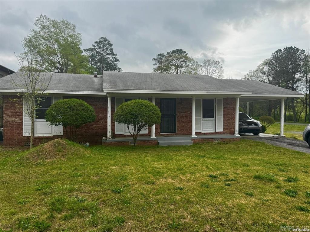Two-for-one opportunity! This charming brick home offers 3 bedrooms and 2.5 baths with plenty of room to live and entertain. Enjoy a large living area featuring a cozy woodburning fireplace, plus an additional family room for added flexibility. The eat-in kitchen provides a comfortable space for everyday meals and gatherings.  This property also includes the adjacent commercial lot, making it a unique investment. Ideally positioned on Carpenter Dam Road and surrounded by established businesses, the lot offers excellent visibility and potential. Conveniently located less than a mile from both the 270W/70W bypass and 270E, this property combines residential comfort with outstanding commercial possibilities.