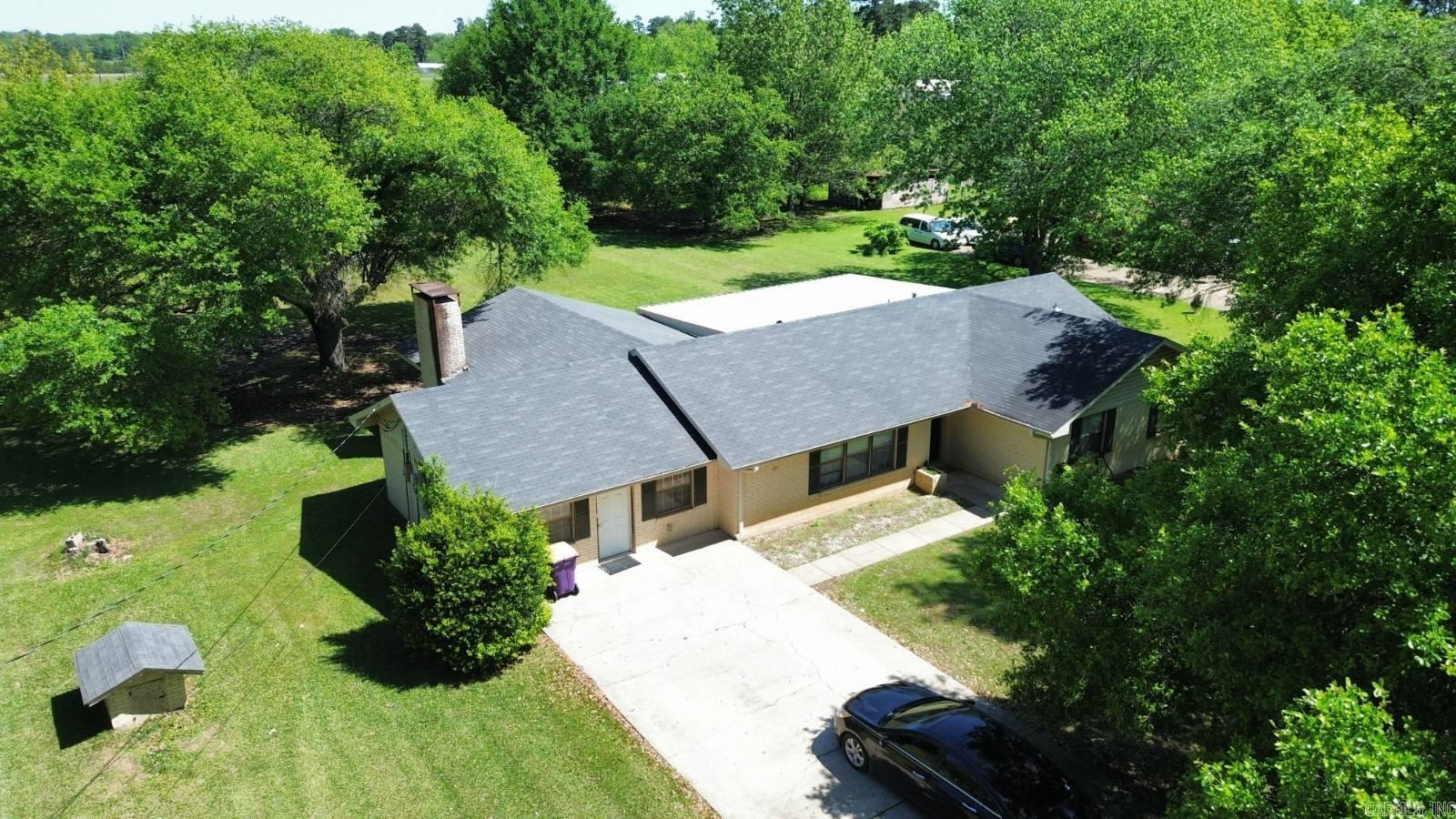 Boasting over 2,400 square feet, this home has all of the room that you need inside and out! It does feature some updates to the home, which have been done since 2022 but they were primarily completed in the last couple of years. They include new interior paint, new HVAC (interior & exterior), completely remodeled bathrooms, a new water heater and new light fixtures. Check out the tile walk-in showers in those bathrooms! To top off this awesome property, it not only includes the parcel that the home is on, but it also includes an adjacent parcel, resulting in a 2.08+/- acre city lot. Be sure to take a look at this one before it is gone!