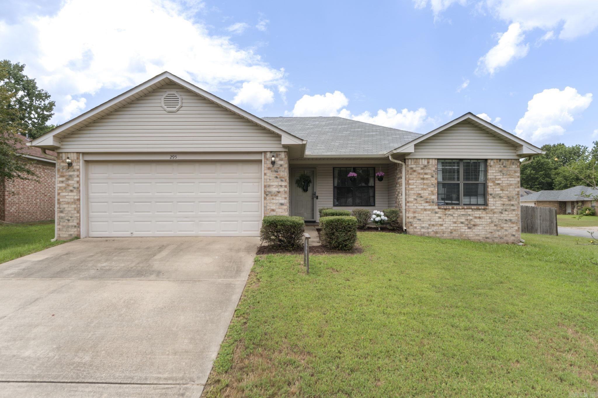 Welcome home to this well-maintained 3-bedroom, 2-bath home in The Falls, one of Conway's desirable neighborhoods! Whether you're buying your first home, downsizing, or looking to add a solid investment property in Arkansas's thriving college town, this home checks all the boxes. Inside you'll find an inviting living area, updated kitchen with island, subway tile backsplash, & open shelving, plus dining area overlooking the fenced backyard. Split-bedroom floor plan offers privacy, while the oversized primary suite features a large walk-in closet. Stylish touches throughout include updated lighting, luxury vinyl tile flooring, fresh neutral paint, and a beautifully designed laundry room. Updates include tankless water heater, level 1 & 2 car charger, newer carpet, smart thermostat, waterfall shower heads, and ring doorbell. Enjoy a level, fully fenced backyard with patio, perfect for pets, entertaining, or relaxing. Conveniently located near the University of Central Arkansas, Hendrix College, Central Baptist College, shopping, restaurants, and I-40, this home offers easy access to everything Conway has to offer. A fantastic opportunity for homeowners and investors alike!