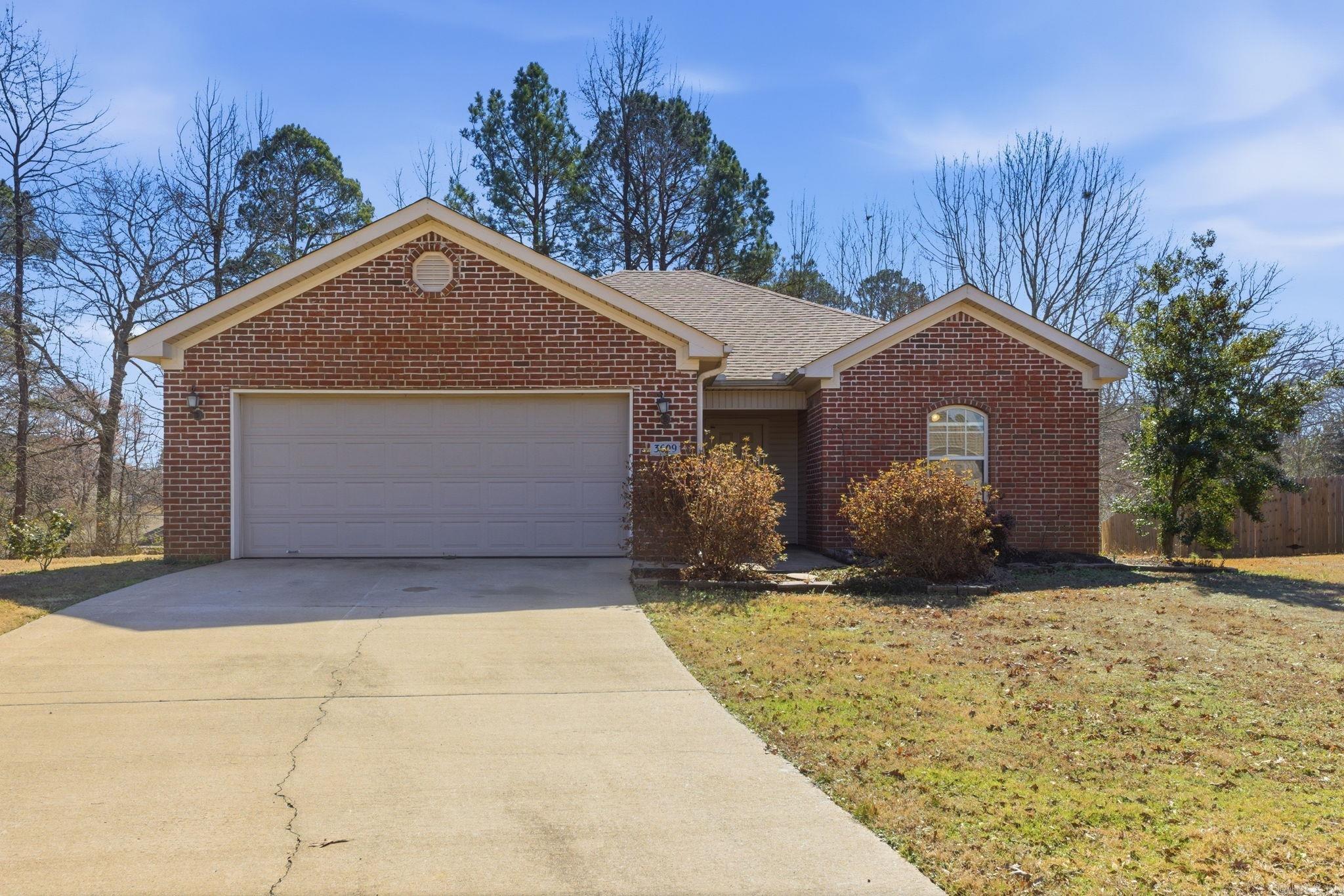 Nice 3 bedroom, 2 bath house in Bauxite Schools!  This home has been freshly painted.  It also has new carpet throughout!  Open floor plan!  Living room is large!  The guest bedrooms are separate from the primary bedroom.  Large primary bedroom & bath.  Large primary closet too!  Nice size back patio. Large backyard!  Great home!  Schedule a showing today!