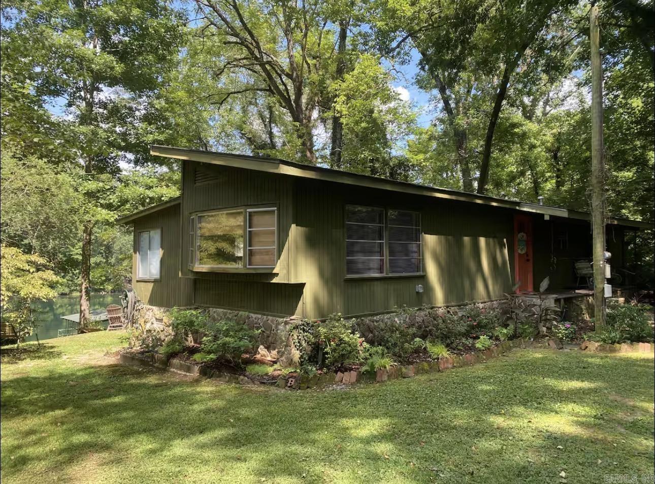 Escape to your own relaxing river retreat on the beautiful Little Red River! This recently updated 3-bedroom, 2-bath mobile home sits on a permanent foundation and offers the perfect blend of comfort, recreation, and peaceful waterfront living.  Spend your days fishing, kayaking, or simply taking in the tranquil river views from the spacious outdoor living areas designed for entertaining or unwinding. A private dock with a boat slip provides easy access to the river, making it effortless to enjoy everything the Little Red has to offer. Located just upriver from the famous Cow Shoals, this property is in an excellent location for trout fishing and enjoying one of Arkansas’s most scenic waterways.  Whether you’re looking for a full-time residence, a weekend getaway, or an investment property, this riverfront retreat offers the ideal setting to create lasting memories. Don’t miss this opportunity to own your own slice of paradise on the Little Red River!