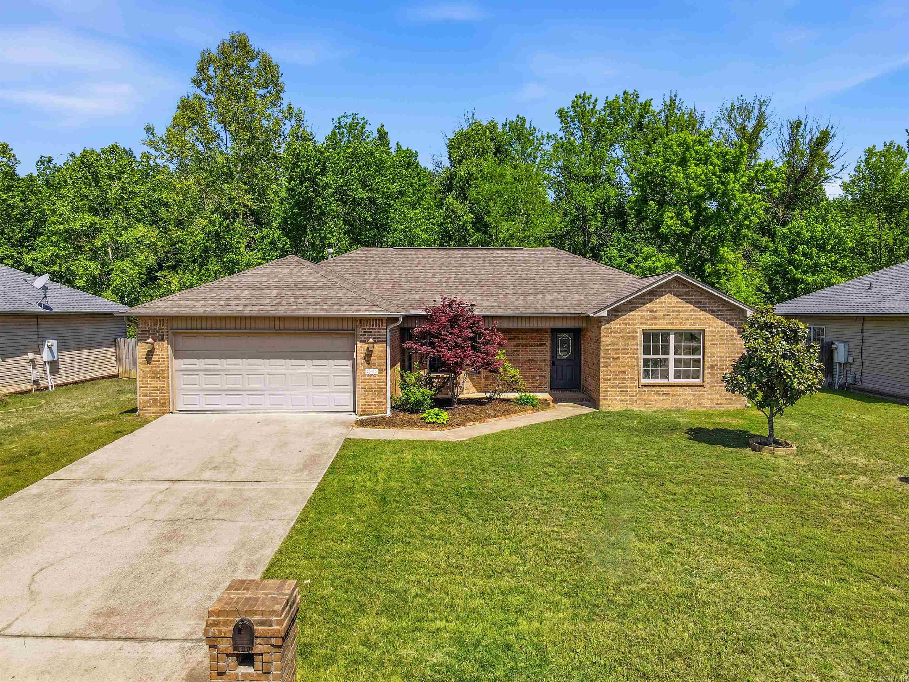Nice split 3BD 2BA floor plan with 1400+sqft.  See through FP in LR/Primary BD with Gas logs.  New Carpet in Bedrooms, fresh paint throughout. Great location, backs up to green area. Fully fenced backyard.