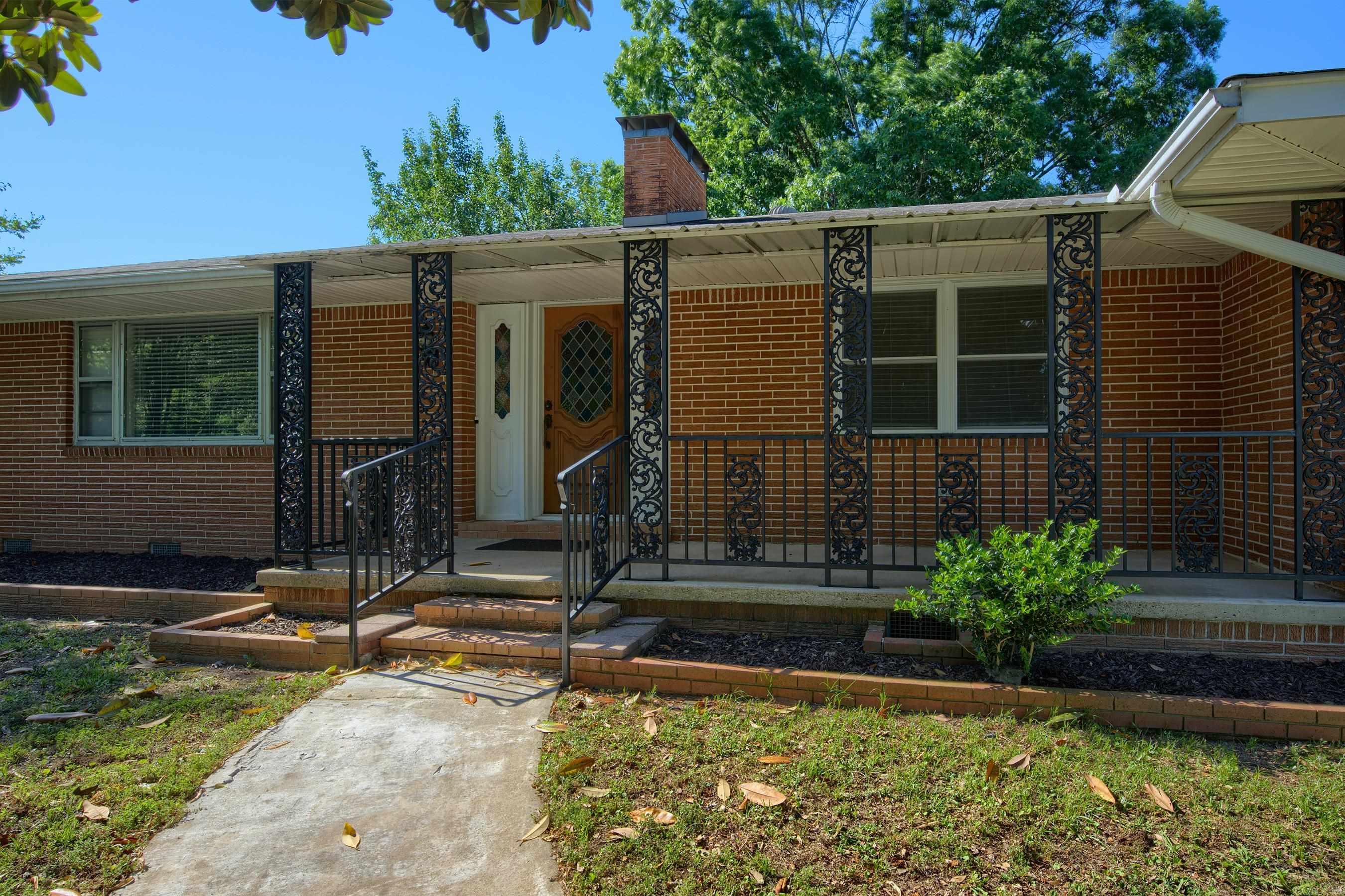 Roomy Mid Century Modern with all the right things! Marble faced fireplace in formal living room, original front door, artistic blocks in garage and winding planter beds frame the back patio! Large rooms with formal dining room, large office that was a 3rd bedroom (add the door back, ask for it in the offer). Bright & cheery updated kitchen with loads of cabinets & natural light. Private back yard space with plenty of room for family fun, gardening and pets. Huge carport for your boat in addition to the side loader garage! You will not run out of parking for your guest with the wide level driveway. This home has many desirable features inside and out & in a well know, desirable & established location. The Greenway trail is at the end of the road for an added bonus for any nature lover seeking to enjoy our beautiful city. Front to the right of the home is an old well for outdoor use, owner never used.