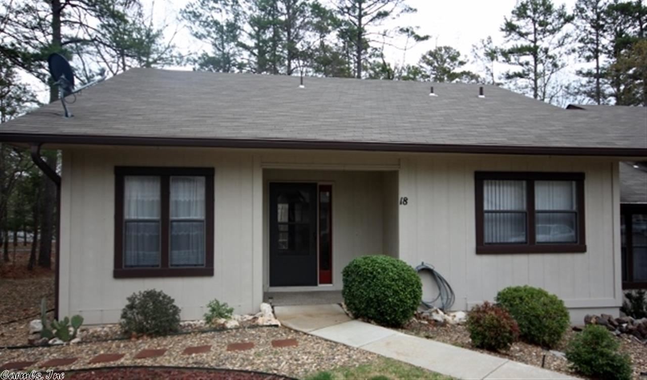 This end unit townhouse has 2 bedrooms., 1 1/2 baths, 1120 sq. ft. & is not far from the front gate.  A great investment opportunity or second home so you can come relax & play golf on one of the many beautiful courses in the Village. Updates include: new roof in 2006; new deck in 2007; new H/A in 2009, ext. repainted in 2008.