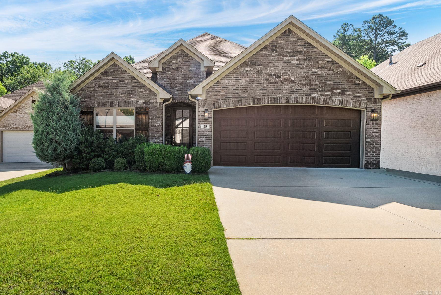Tucked away on a quiet cul-de-sac, this beautifully designed one-level home offers the perfect blend of modern comfort, thoughtful craftsmanship, and everyday functionality. Built in 2019, this 3-bedroom, 2-bath residence features over 2,000 square feet of open-concept living designed for effortless entertaining and comfortable daily life. The spacious kitchen showcases custom cabinetry and flows seamlessly into the living and dining areas, while custom blinds throughout add a polished finish. Retreat to the private primary suite featuring a generous walk-in closet, dual vanities, an oversized walk-in shower, and a relaxing jetted tub. Step outside to enjoy the screened porch overlooking a large, fully fenced backyard with peaceful wooded views, creating a private setting for outdoor living. Additional highlights include a two-car garage, professional landscaping, sprinkler system, tankless water heater, and quality finishes throughout. Combining modern efficiency, timeless style, and an exceptional location, this move-in-ready home is one you won't want to miss.