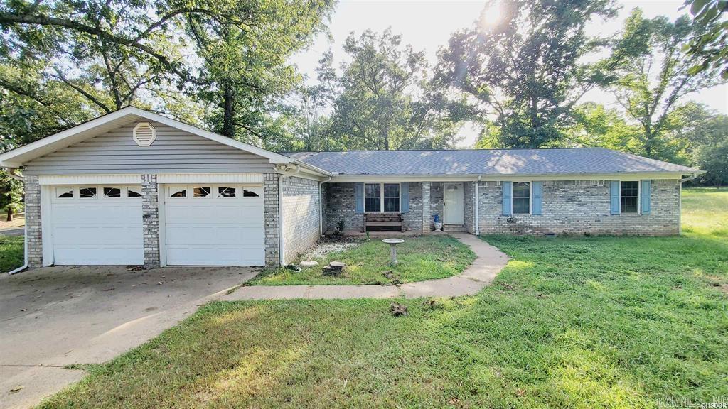 This all brick home perfectly situated on a level lot surrounded by 1.54 acres of cleared land, has more to offer than just Lake Hamilton School District.  It boasts a 2 car garage, fireplace, ample bedrooms, an office, 2 living spaces, spacious eat in kitchen with a counter top seating area.  Not only do you get all of these, but you gain a home with structural integrity, a roof replaced in 2024 with level 3 architectural shingle Atlas system roof, New internal HVAC fan in 2026, ADT security system with 3 outside cameras and 1 inside camera, glass shatter sensors plus video doorbell. Run your home from your phone! Smart thermostat compatible with Google and Alexa, smart home appliances, washer, dryer, refrigerator, all purchased within the last 5 years! This home is also wired for FIBER internet.  Truly a place to settle into security and comfort. Call today! Shari 501-418-1516