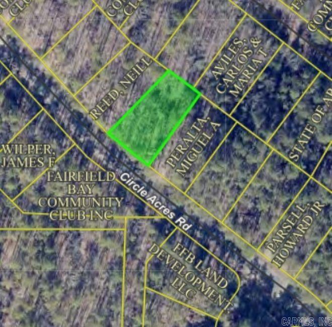 Vacant/Undeveloped residential lot located along Circle Acres Rd in Fairfield Bay. This property is located less than a mile from a Greers Ferry Lake boat ramp!  Owner financing is available.