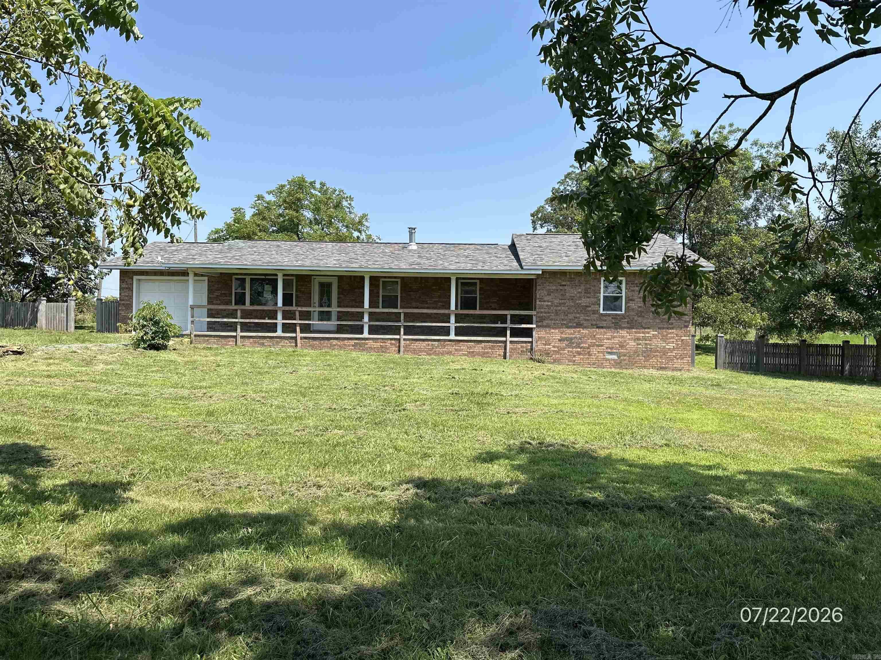 Nice brick home on 10 acres that features 3 bedrooms, 2 full baths, a ready chicken coop and a fenced area ready for a few livestock until you get the rest fenced. It conveniently has city water but there is also a well. There are mature peach and walnut trees and a nice muscadine vine already in place.  There is a shed and a storm shelter outside and for your convenience a small storm shelter accessed from inside the house. This house is ready for a family to make it into a home.