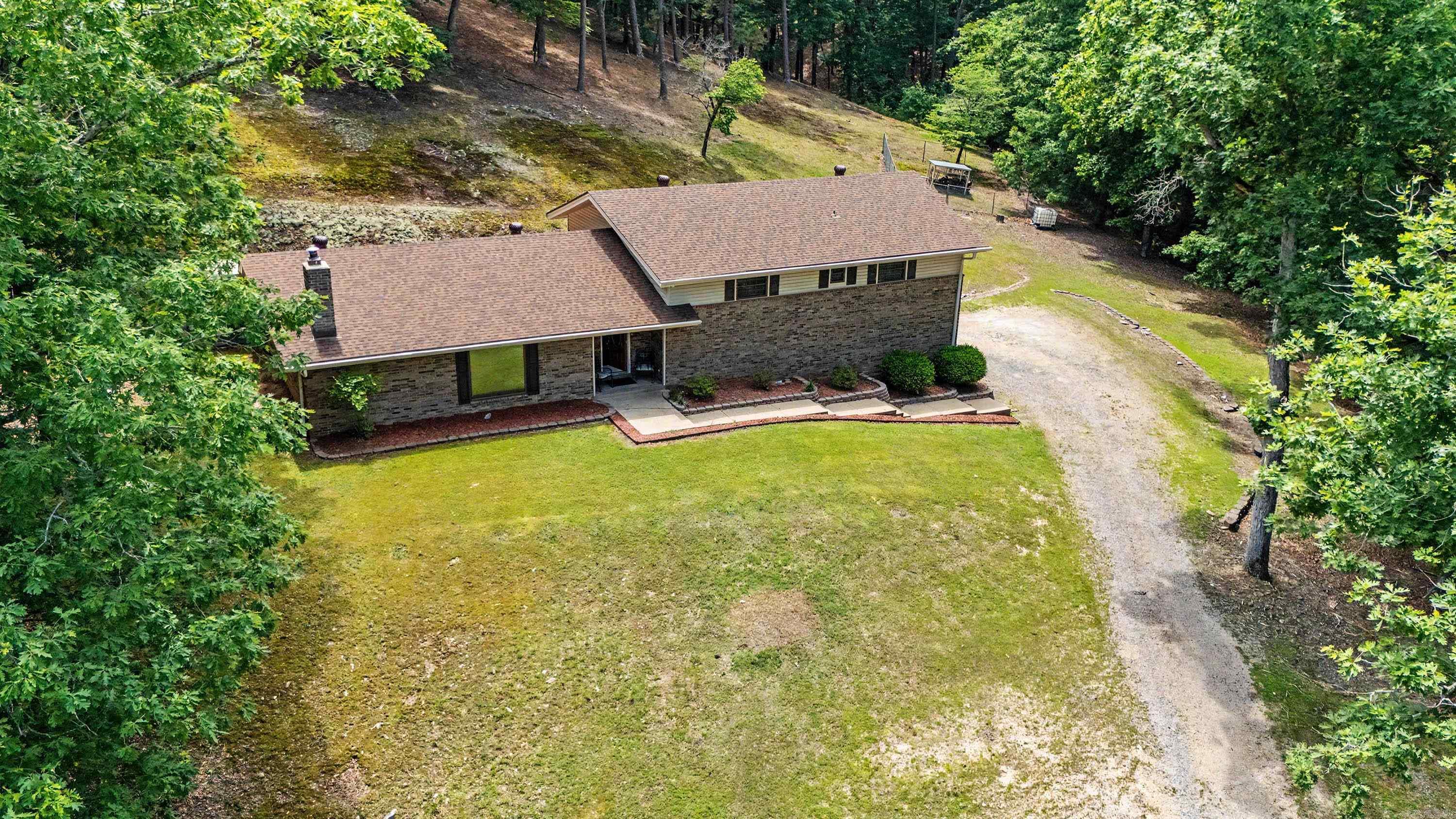 Tucked away on peaceful acreage just minutes from West Little Rock, 3614 Garrison Rd offers the rare blend of privacy, convenience, and updated living. This secluded property gives you room to breathe while keeping you close to shopping, dining, schools, and everyday essentials. The home features many recent updates throughout, creating a fresh and inviting feel while still maintaining the quiet charm of a private retreat. Whether you’re looking for space to spread out, enjoy nature, entertain, or simply escape the noise without leaving town, this property delivers. Acreage this close to West Little Rock is hard to find, and this one offers the lifestyle so many buyers are searching for: privacy, comfort, and convenience all in one place. See docs on file for updates