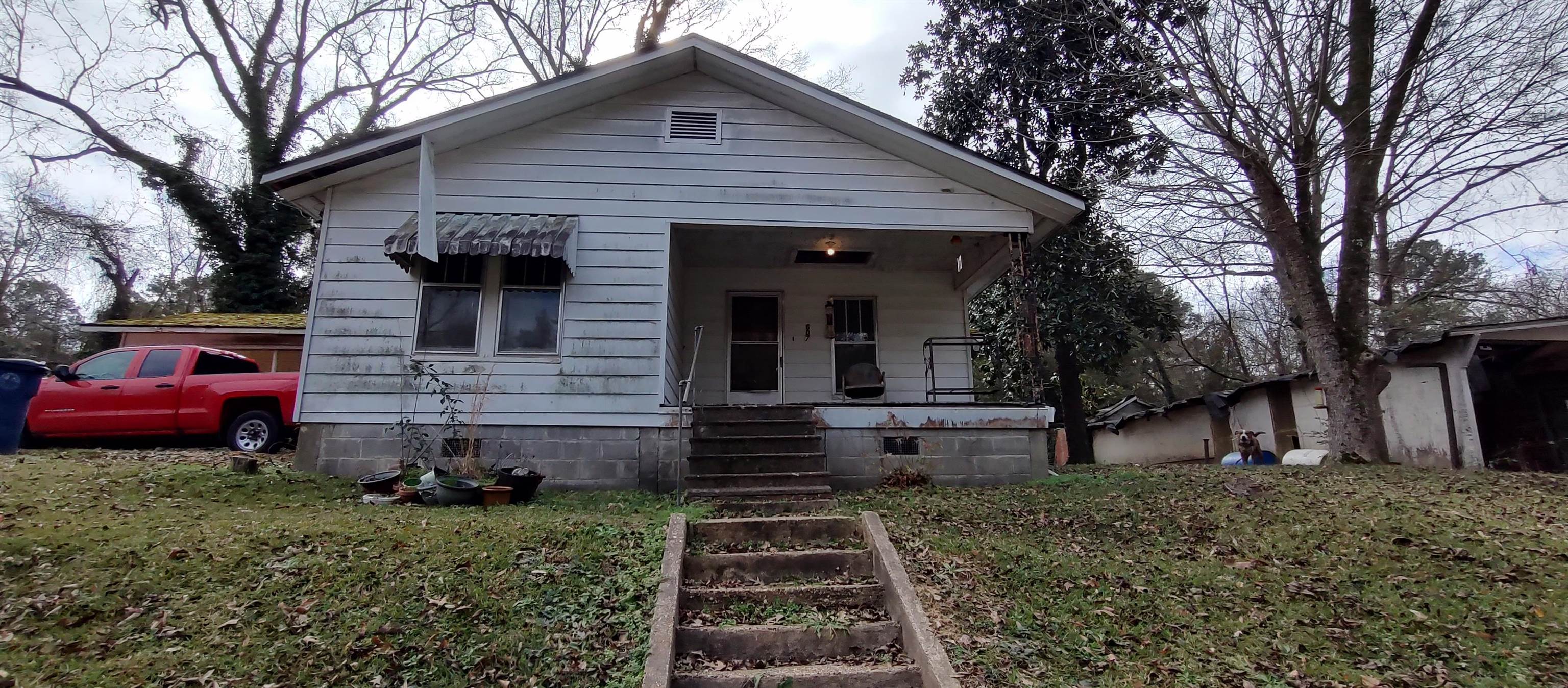 3 bed, 2 bath, fixer-upper with endless potential! Perfect for investors or those looking to make it their own. Don't miss out - schedule a showing today! Square footage, lot size, and acreage is taken from courthouse records.
