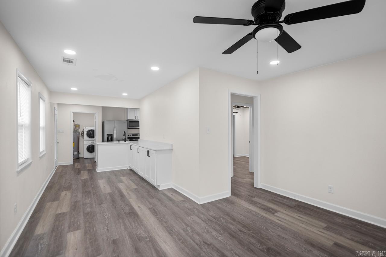 Welcome to 3137 Center St., a beautifully renovated 3-bedroom, 2-bathroom home combining modern style with timeless char. This home boasts a stunning new kitchen with stainless steel appliances, shaker cabinetry, and ample counter space - ideal for both family meals and entertaining. The spacious primary bedroom features a walk-in tile shower with elegant fixtures, complemented by a stylish barn door that adds a touch or rustic harm. Each bedroom is filled with natural light, and both bathrooms have been remodeled with contemporary finished. With new flooring, fresh paint, and updated fixtures throughout, this home is truly move-in ready.