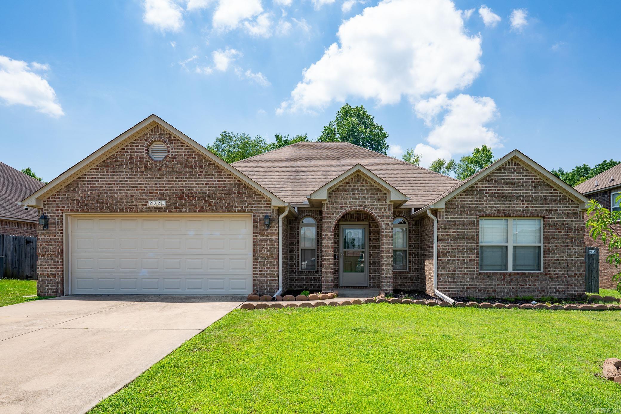 Beautiful completely move-in ready home in Conway's desirable North Hills neighborhood just off Hwy 65 with easy access back to I-40! This open, split-bedroom floor plan offers luxury vinyl plank flooring throughout much of the home, abundant recessed lighting, and a spacious living area perfect for everyday living and entertaining. The kitchen features granite countertops, ample cabinetry, and a functional layout. The private primary suite includes a jetted tub, separate shower, double vanity, and large walk-in closet. Enjoy the peaceful level backyard setting with a covered patio and mature tree line providing added privacy. Situated on a spacious lot with convenient access to shopping, dining, schools, and I-40. Move-in ready and waiting for its next owner. Schedule your showing today!