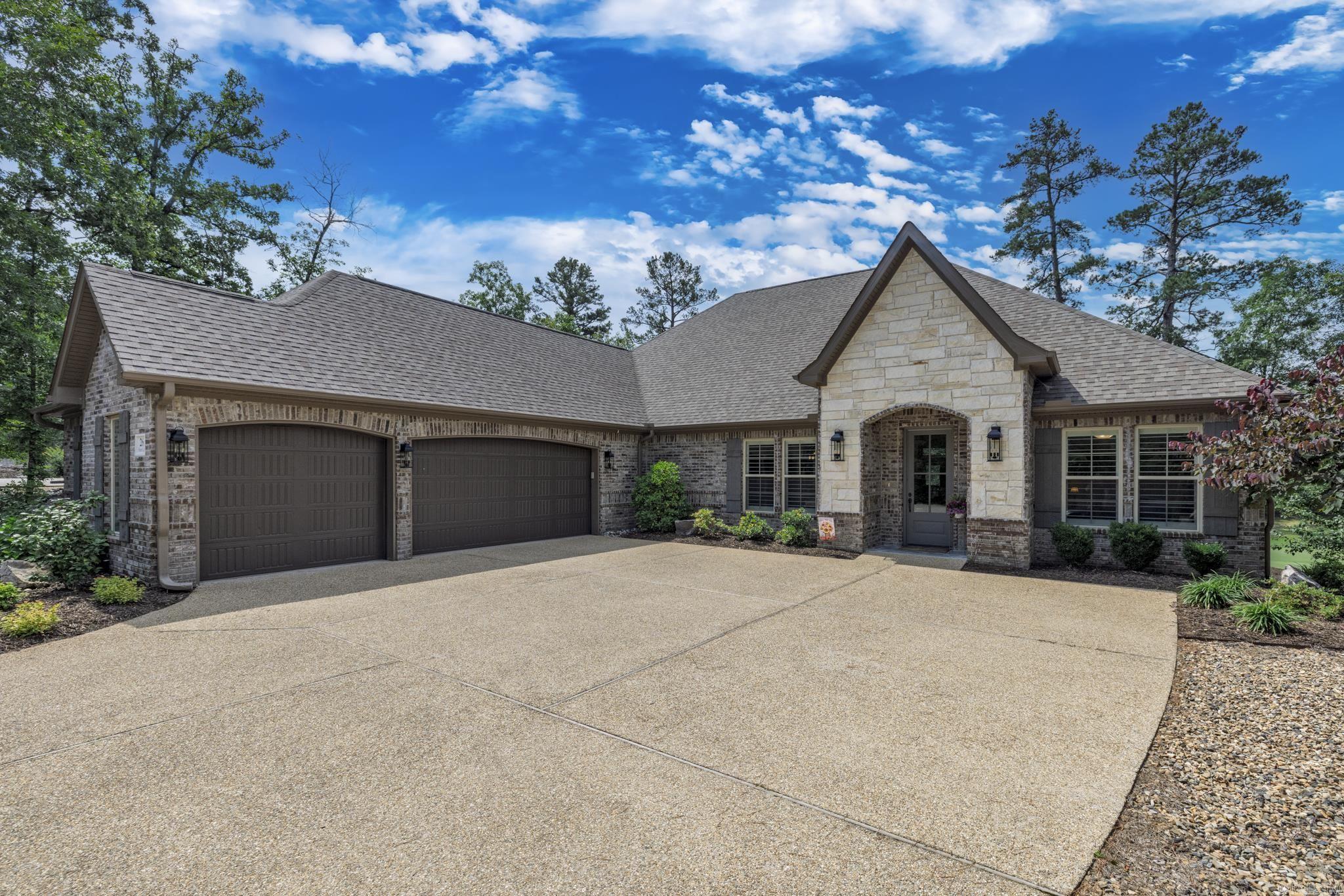 This beautiful Golf Course home built in 2020 by Carriage Homes is situated on Isabella Pinta hole #5 and provides gorgeous views of the fairway!  From the moment you step into the foyer with its custom wood barrel ceiling, you will find so much to love about this home! Discover expansive windows across the back providing loads of natural light, a gorgeous kitchen with quartz countertops, double ovens, gas cooktop, pull out spice drawers, huge walk-in pantry, and decorative glass front cabinets. Living room features built in shelving on either side of the gas fireplace and wood beamed ceiling. Double French doors lead to an expansive patio perfect for entertaining, watching the golfers, or simply enjoying the wildlife! The Primary suite is large enough to accommodate a sitting area, and Primary bath includes double vanities, an oversized soaking tub, and glassless walk-in shower. The laundry room is accessible from the hall or through the Primary bedroom closet. Other features include plantation shutters, epoxy floor in 3-car garage with walkup stairs to a partially floored attic ideal for storage. Don't miss this special home! $2000 Buy-in Fee applies to first time HSV buyers.