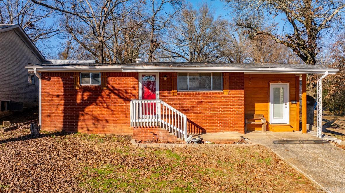 This charming home in North Little Rock features an updated kitchen with gas range and built-in pantry, perfect for those who love to cook. This home also features a bonus space that can be used as a 3rd bedroom, office or den, making it the perfect space for growing families or those in need of a home office. Additional updates include new luxury vinyl flooring and fresh paint. The new roof provides peace of mind for years to come. Two of the bedrooms feature original hardwoods. The large living space is perfect for family gatherings or movie nights with friends. The back patio is perfect for grilling and entertaining guests during the warmer months. The back yard is fully fenced, providing a safe and secure space for children and pets to play. Overall, this home is a perfect blend of modern updates and classic charm, creating a warm and inviting space for you and your loved ones to call home.