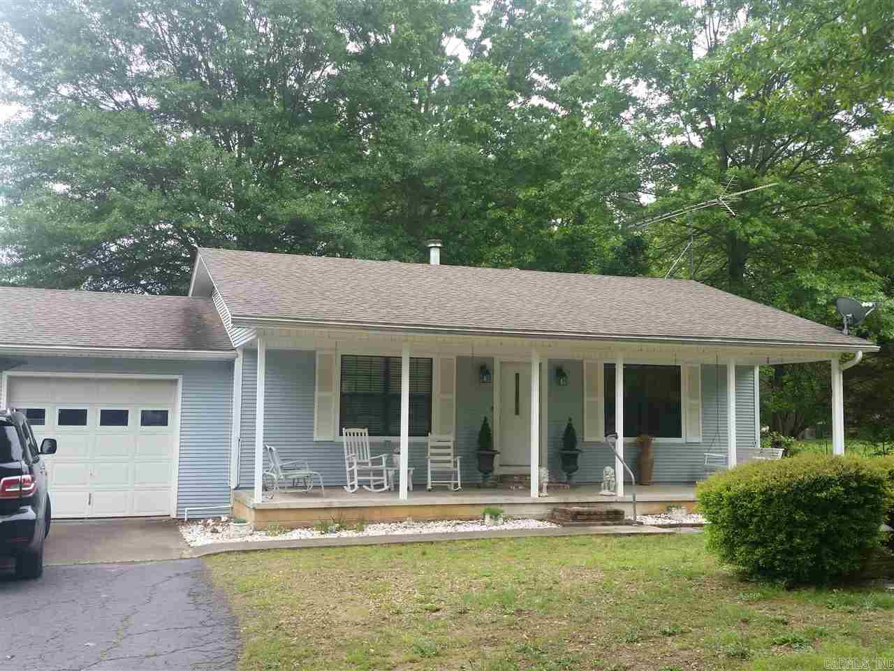 This home is immaculate kept up. Country living at its best. Come relax on this large front porch!!! Living Room has real Hard wood floors with lots of updates!!! All fresh paint!!! Sitting on over 1.5 acres with 2 shops on property Sellers have done lots of work to the home and property. come see this one today. Sq ft approx. pls measure. See agent remarks