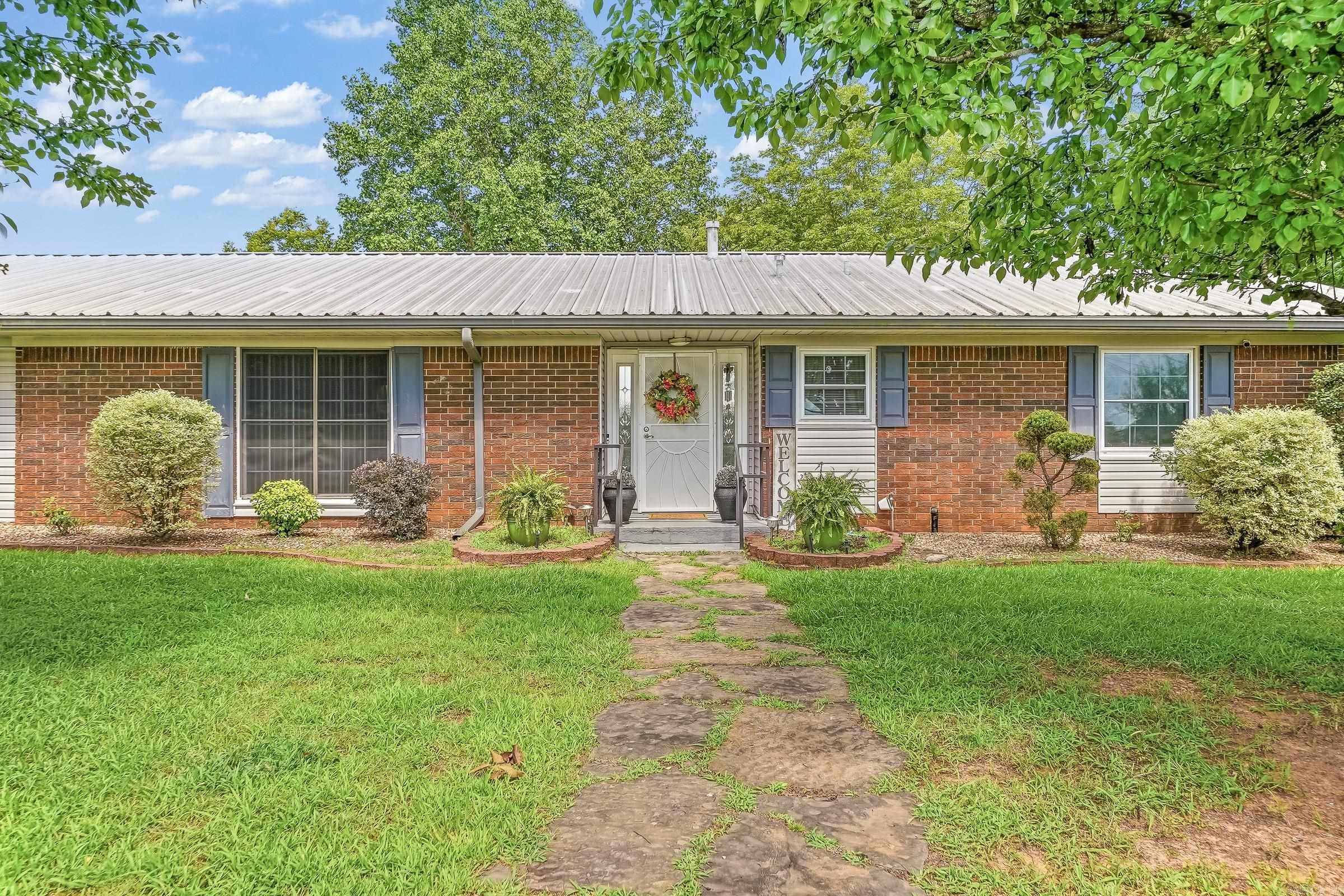 Welcome home to this spacious and beautifully maintained 4-bedroom, 2-bath brick home offering approximately 2,500 square feet of comfortable living space on a beautifully landscaped 0.57-acre (+/-) lot in the heart of Horatio. Built in 1960, this inviting home blends timeless character with modern comfort, featuring multiple living areas, a spacious dining room, generously sized bedrooms, and an oversized laundry/mudroom with exceptional storage. Large windows fill the home with natural light, creating a warm and welcoming atmosphere throughout. Outside, you'll find mature trees, attractive landscaping, covered parking, and a charming backyard gazebo that provides the perfect setting for entertaining, relaxing, or enjoying family gatherings. The spacious yard offers plenty of room for gardening, pets, play, or future outdoor projects. Conveniently located near schools and local amenities, this move-in-ready property offers the perfect combination of space, comfort, and curb appeal. Homes with this much room inside and out don't come along often. Schedule your private showing today!