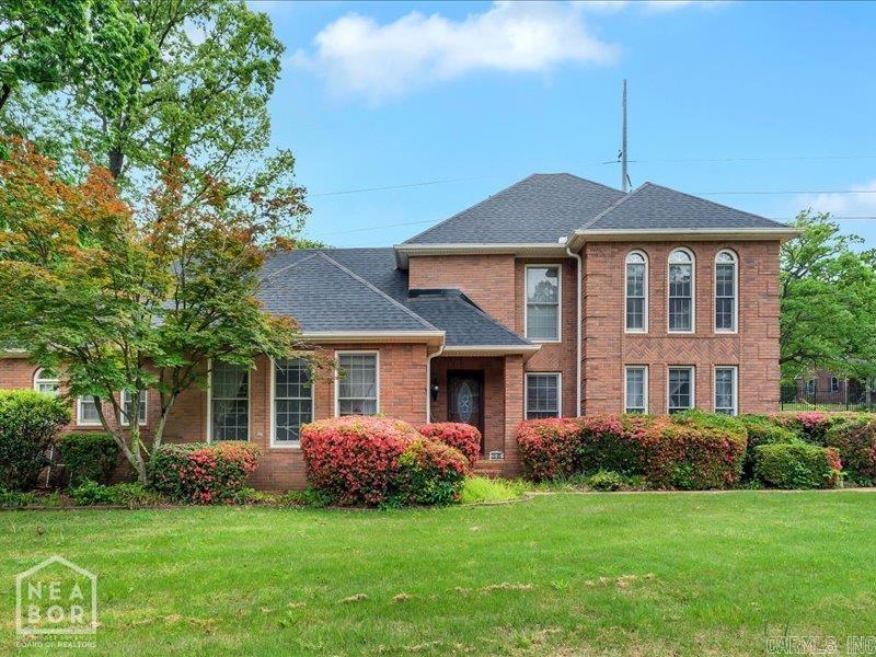 Welcome to this beautifully crafted 2,957 sq. ft home in the highly desirable Oak Forrest neighborhood of Jonesboro. Built in 2004, this elegant two story residence blends timeless masonry construction with modern comfort, offering 2.5 baths, spacious living areas, and a serene setting on a generous 0.65 acre lot.    Step inside to find an inviting layout featuring tile flooring, central heating and cooling, and a cozy fireplace that anchors the main living space. Large windows fill the home with natural light, creating a warm and welcoming atmosphere throughout. The kitchen, dining, and living areas flow seamlessly ideal for both everyday living and entertaining. Upstairs and downstairs spaces provide flexibility for bedrooms, office use, or guest accommodations.    Outside, the property features a stone exterior, patio, and a finished attached masonry garage with 576 sq. ft of space perfect for vehicles, storage, or hobby use. The expansive lot offers privacy and room to enjoy outdoor living.