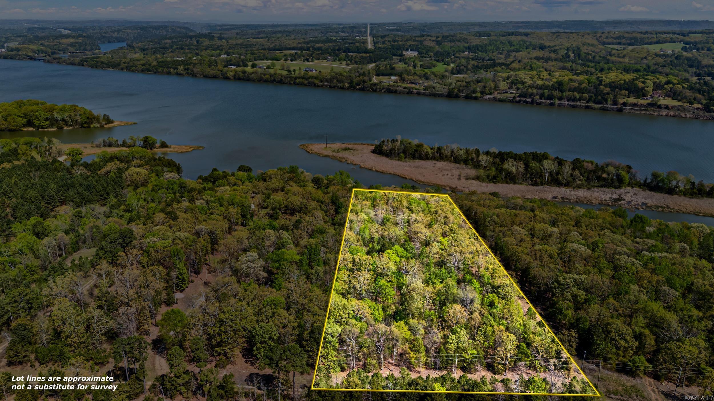 6 acres on Lake Dardanelle! Beautiful wooded tract with privacy, abundant wildlife, and multiple potential building sites. Perfect for a dream home, cabin, or recreational retreat. Enjoy the peace of country living with close access to the water and outdoor activities.