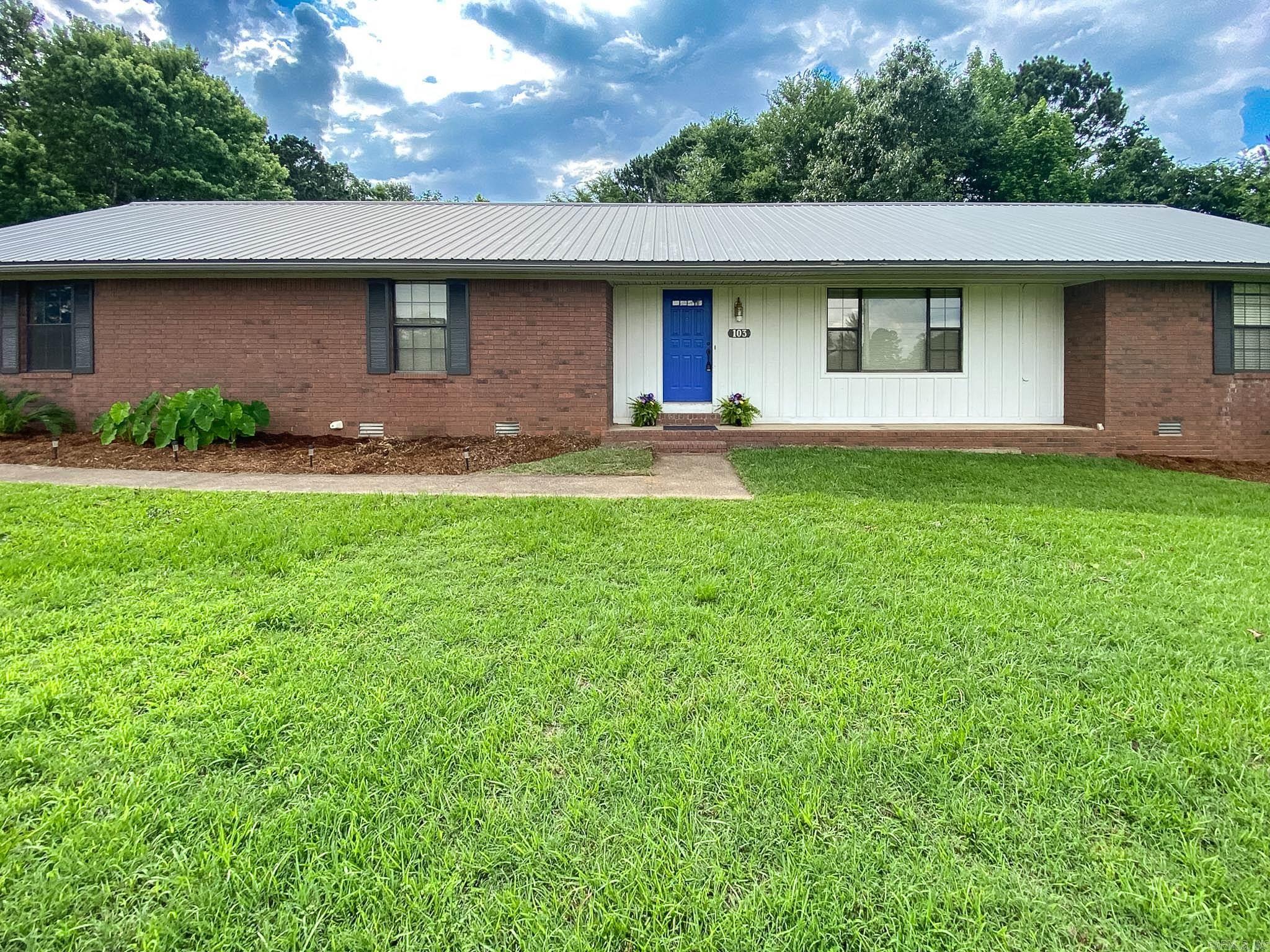 Looking for space, flexibility, and a unique setup you won't find every day?  This one-owner property offers the rare convenience of two separate homes connected by a shared pantry/laundry area, creating the perfect opportunity for:  Multi-generational living Aging parents or adult children Guest quarters Live-in caregiver accommodations Additional privacy for family members  Situated just outside the city limits in a peaceful setting, this property provides room to spread out while remaining convenient to everything Arkadelphia has to offer.  The main residence features three spacious bedrooms, each with its own private ensuite bath, along with a comfortable living room, functional kitchen, and an attached two-car garage. The secondary living quarters provide excellent flexibility with a private one-bedroom, one-bath layout complete with its own living room, kitchen, and dedicated carport — ideal for guests, extended family, or multi-generational living.  With a peaceful setting and room to make it your own, this property is full of potential and is ready for a new owner to bring fresh vision.