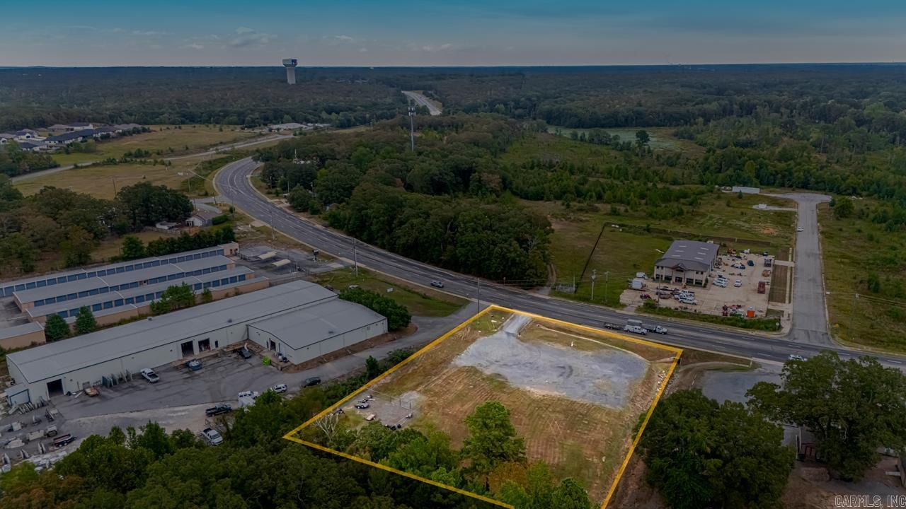 Excellent Commercial Development Opportunity in Sherwood! Located at 15621 Highway 107, this prime 1.47-acre tract offers exceptional visibility along one of Sherwood’s busiest commercial corridors. The property is zoned C-3 (General Commercial), allowing for a wide range of potential uses including retail, office, restaurant, or service-based businesses.  The lot is flat, cleared, and build-ready, with access to all public utilities, making development efficient and cost-effective. With high traffic counts and easy accessibility, this property is perfectly positioned for a new business or investment project. The generous size provides plenty of room for building, parking, and future expansion.  Sherwood continues to see strong commercial growth, and opportunities like this are rare. Whether you’re an investor or business owner, this site offers the perfect combination of location, zoning, and utility access to bring your vision to life.