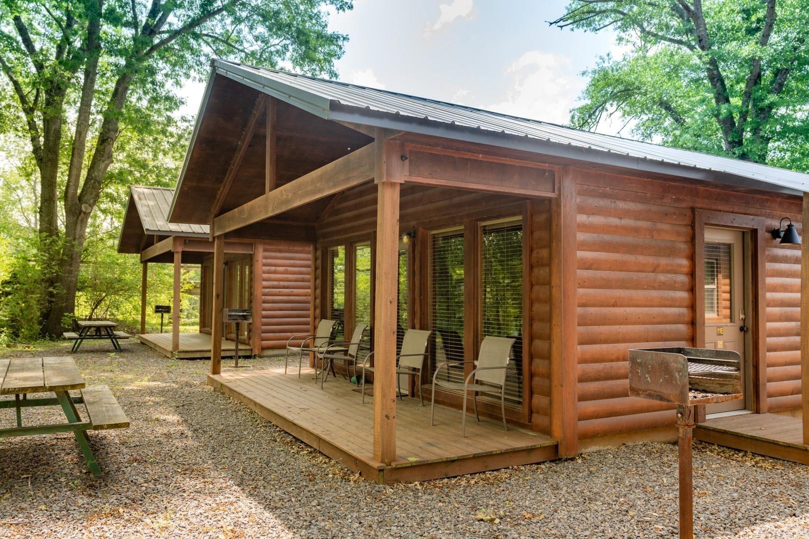 Riverfront Cabin with boat slip!!!  Located on Winkley Shoals on the Little Red River, this 2-bedroom cabin (1 of 12 cabins) was built in 2014, it's completely furnished and it has an excellent rental history!  Walk-in access to one of the largest wadable fishing areas on the Little Red!  10 minutes to Greers Ferry Lake and to Wal-Mart!  The property is in EXCELLENT CONDITION!  Taxes for each individual unit are not yet determined.