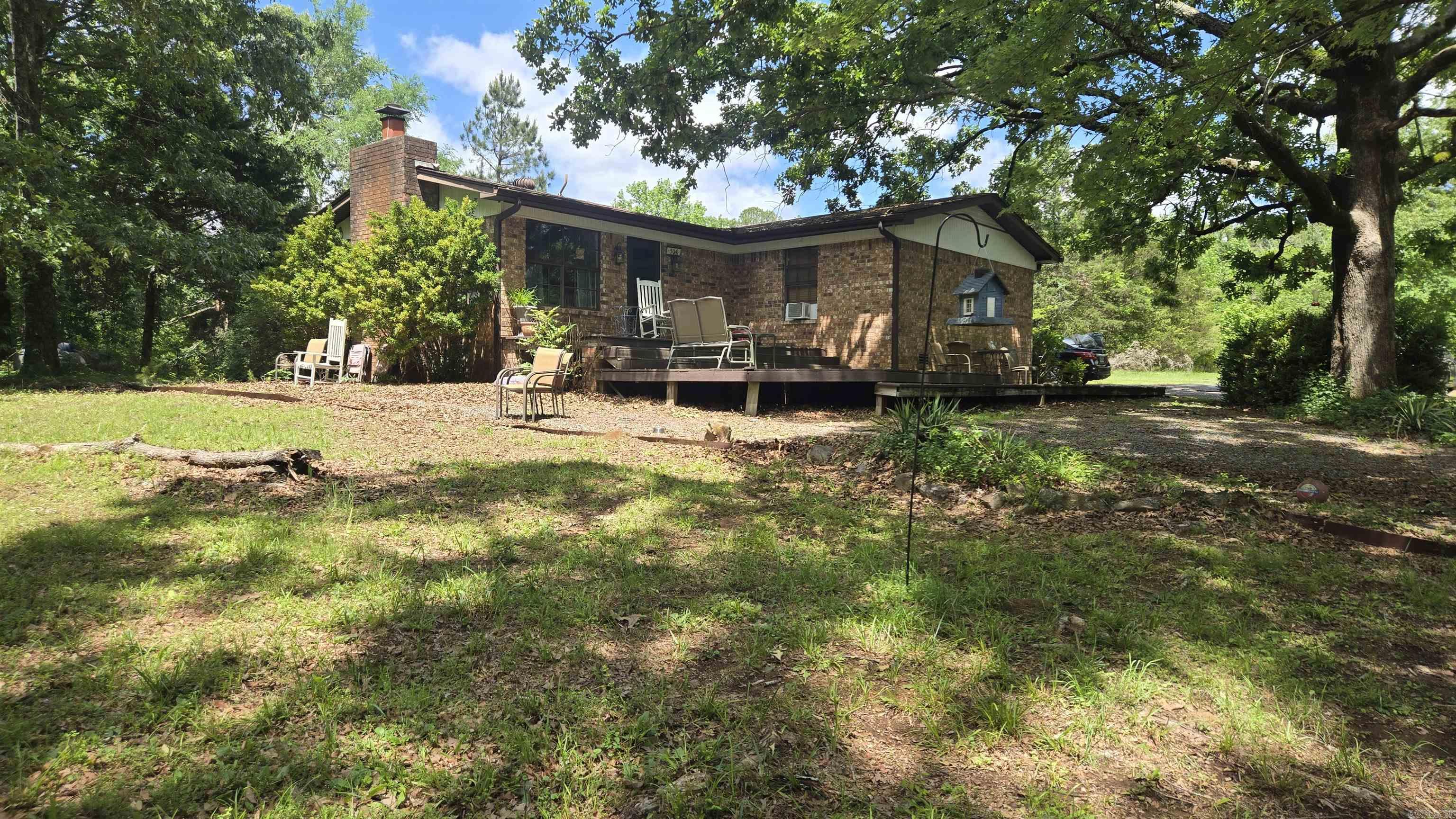 This is 2 homes on 2.65 acres Main home is Approx. 1232 Sqft . 2 bedroom 2 bath with Arkansas Room  and wood fireplace. Second living Space is detached from Main home is a 2 bedroom 1 bath home with a 1 car garage with  storage area. Also a work shop Approx 12x12.  City water  In fountain lake school district Its a must see!! Call or Text Angela Garrett @ Hot Springs Village Real Estate for Appointment 501-209-1243